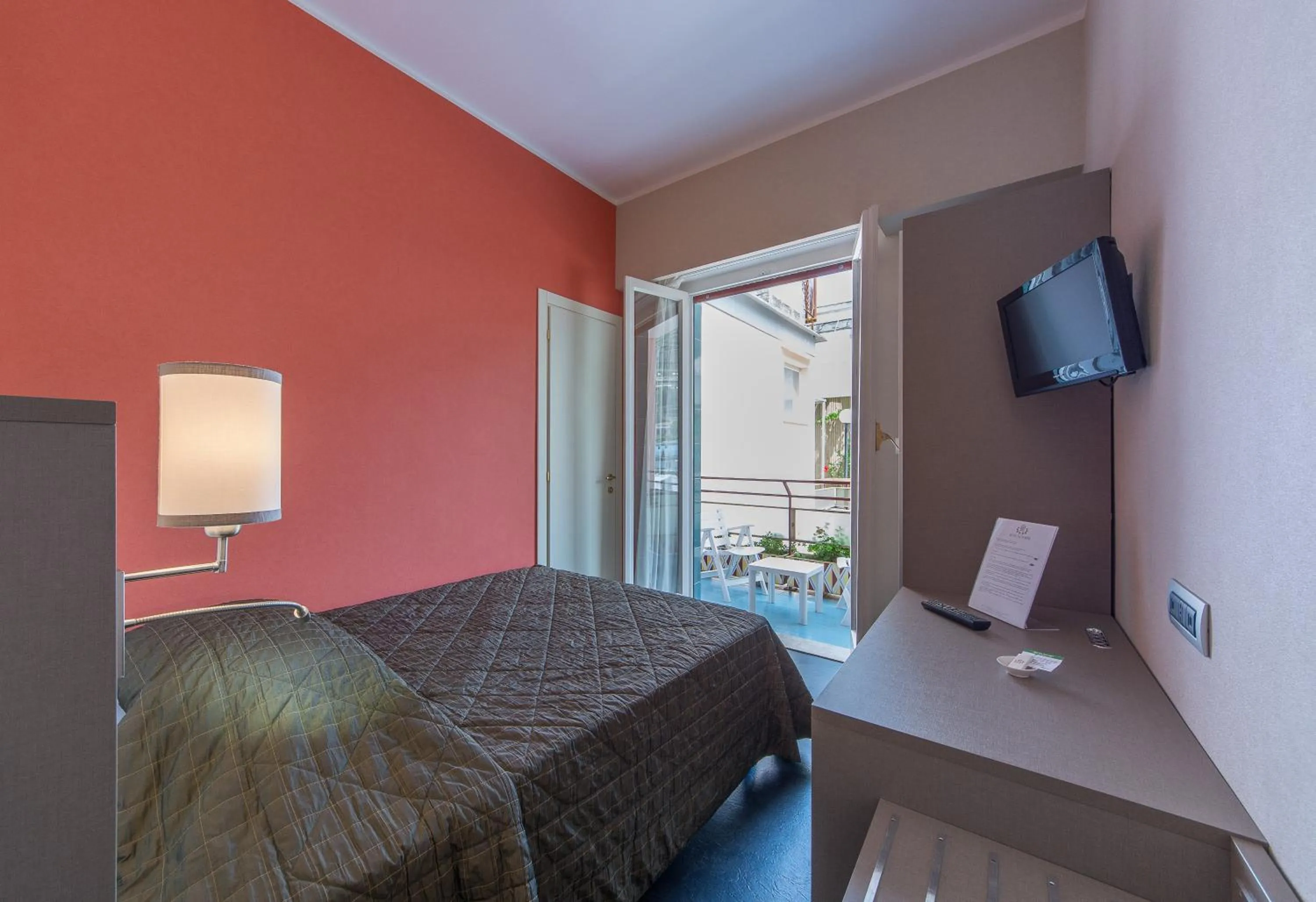 Bed in Reginna Palace Hotel