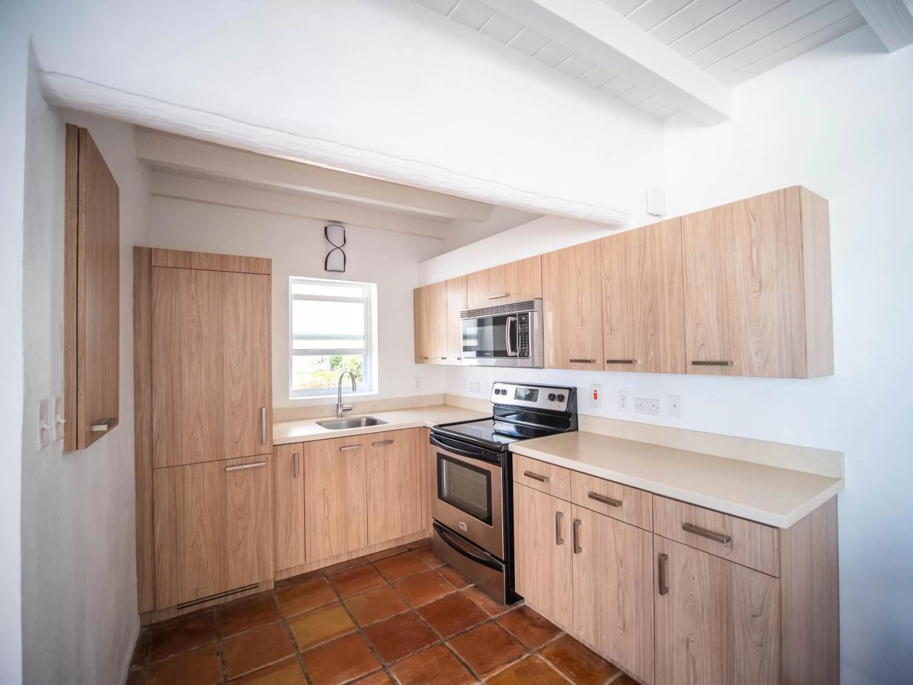 Kitchen or kitchenette in Windjammer Landing Resort and Residences