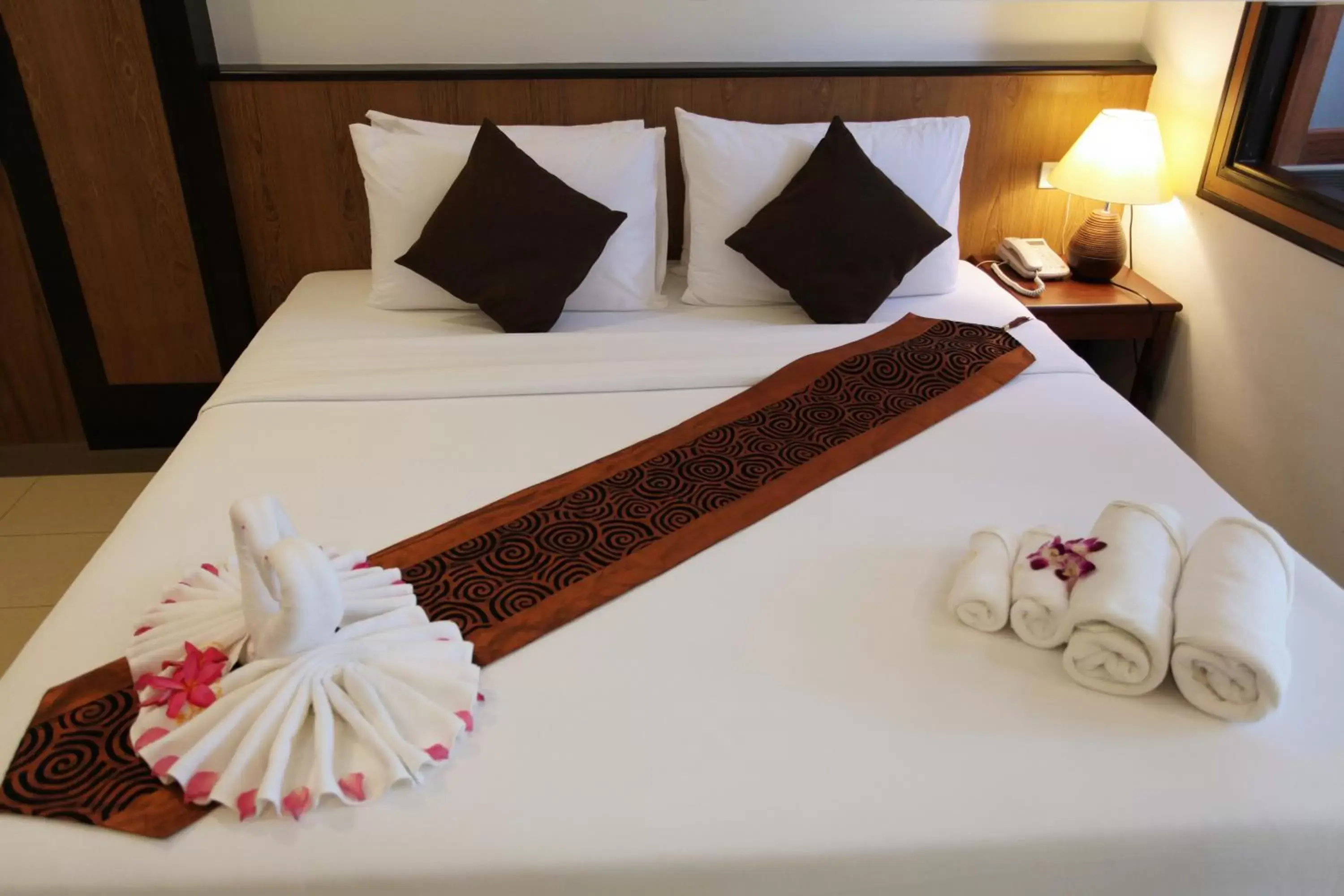 Decorative detail, Bed in Rapeepan Ville Hotel