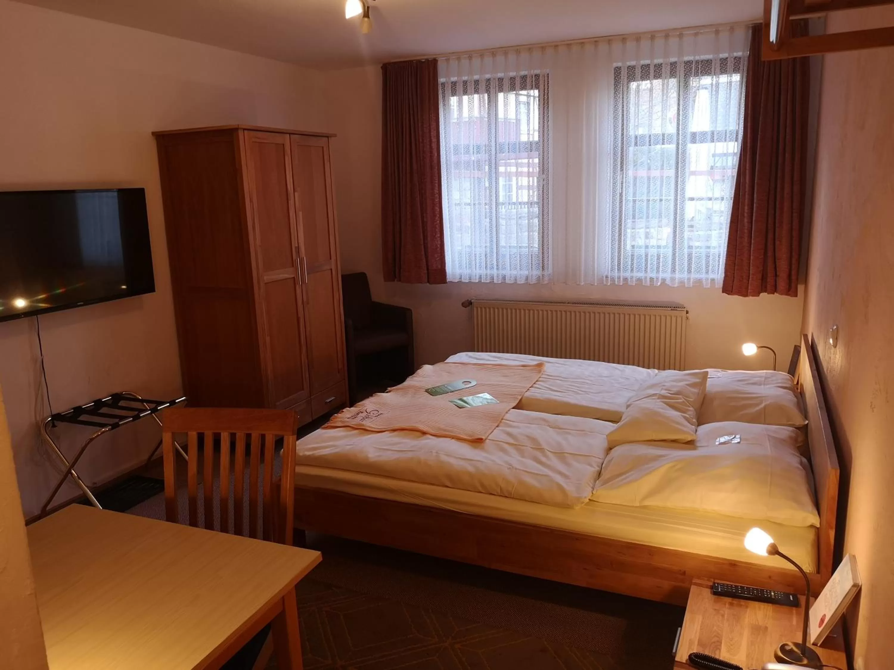 Photo of the whole room, Bed in Hotel Goldflair am Rathaus