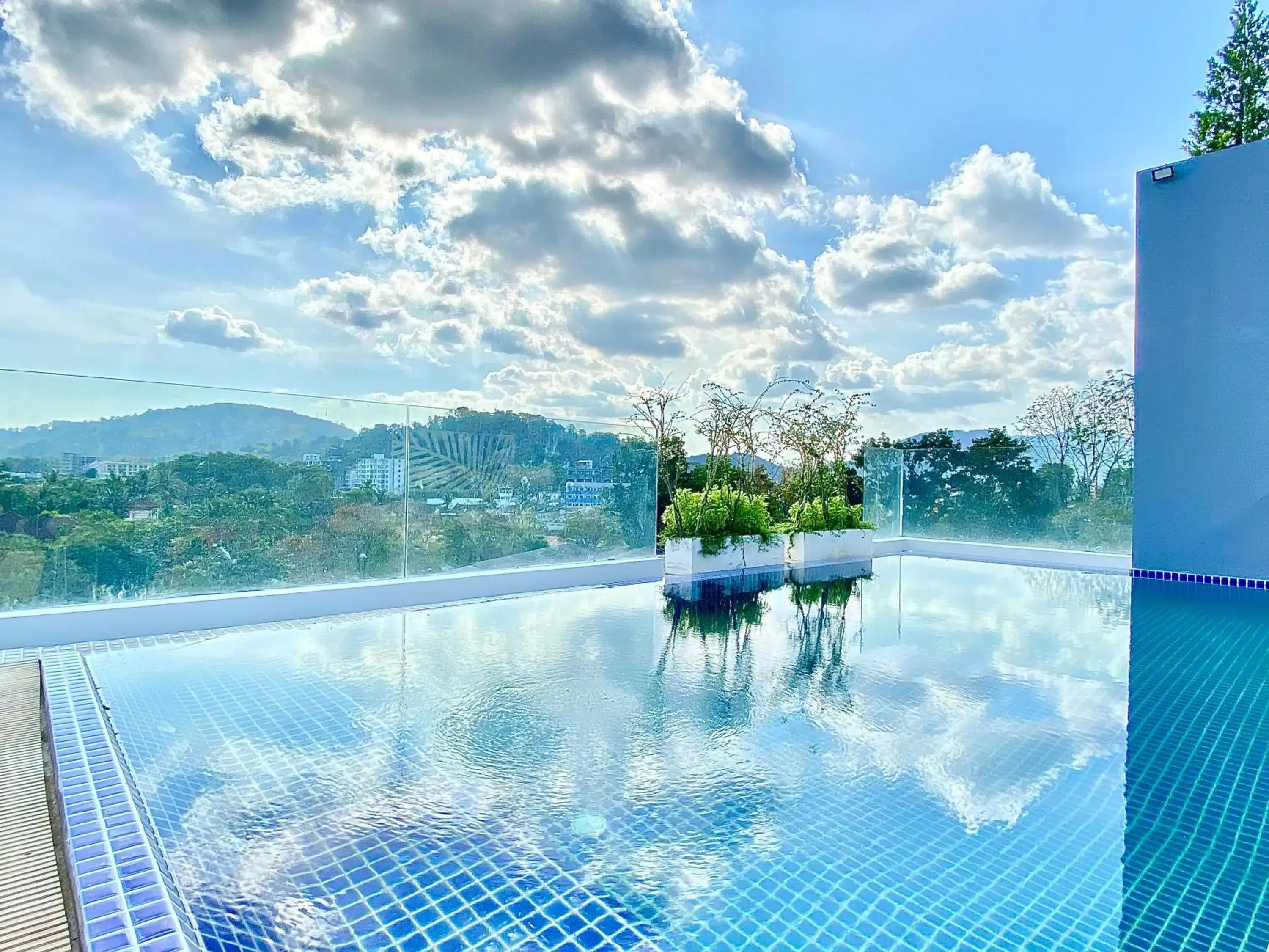 Swimming pool in The Palms Residence - SHA Extra Plus Swimming pool in The Palms Residence - SHA Extra Plus