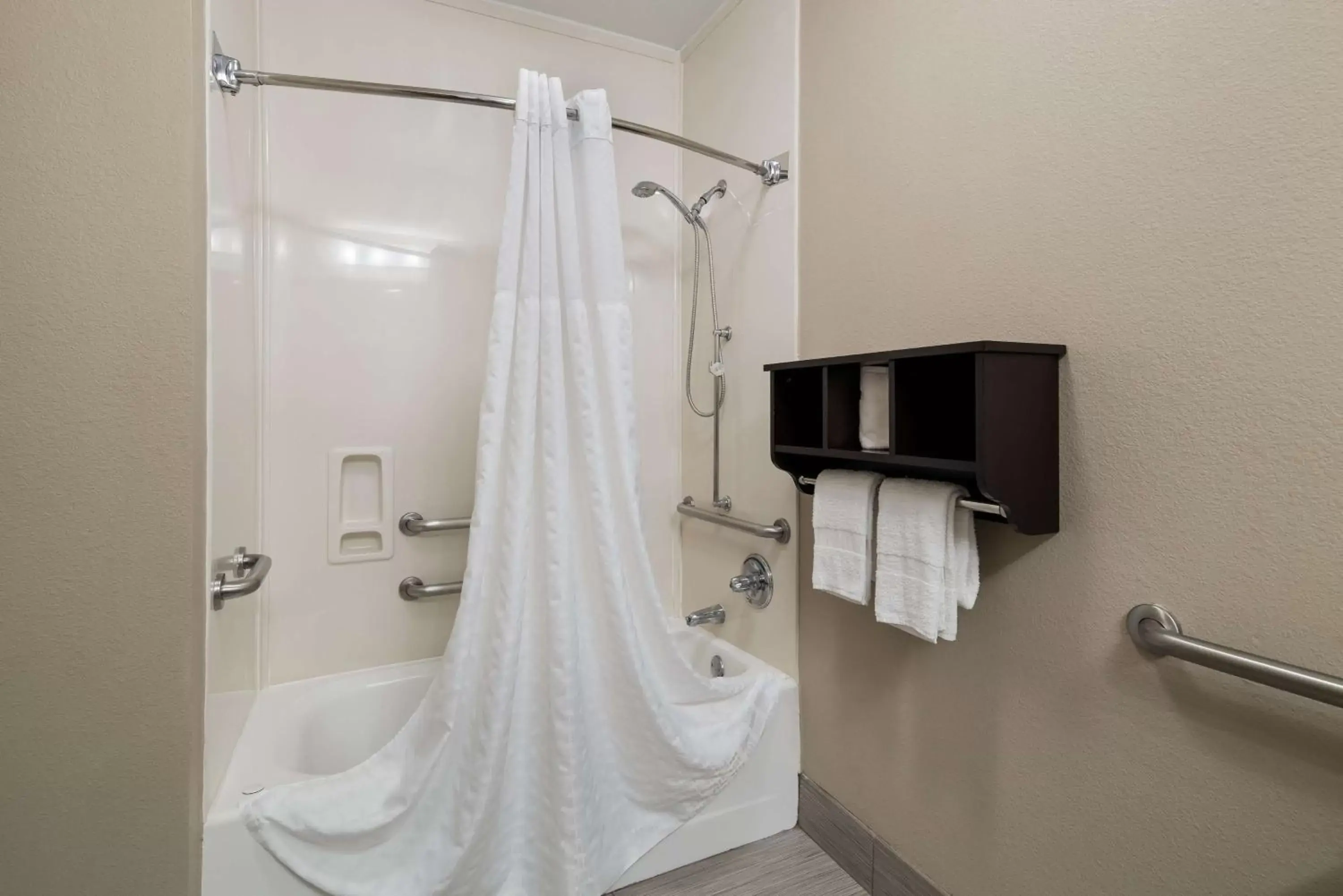 Bathroom in SureStay Plus Hotel by Best Western Plano