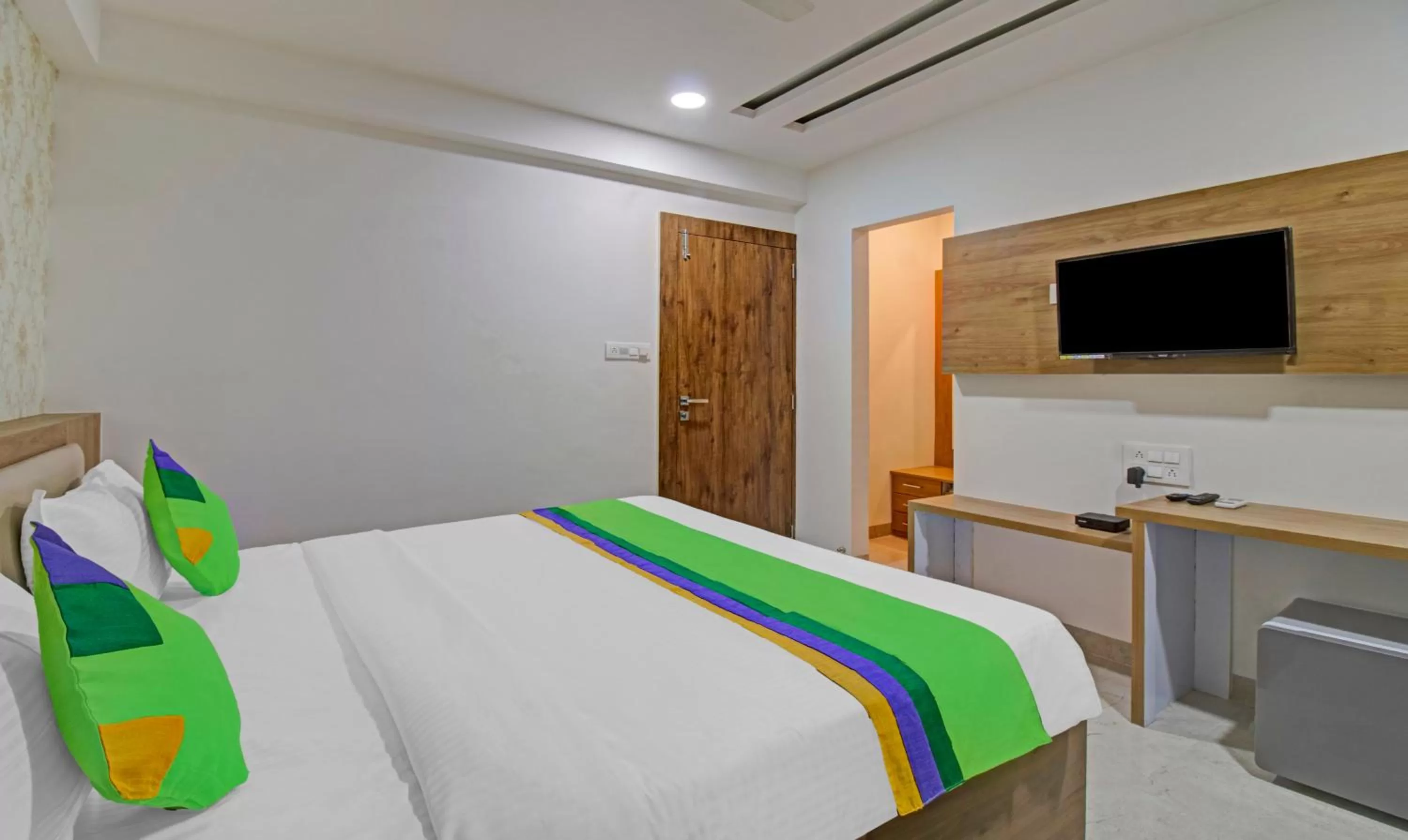 Bedroom, Bed in Treebo Chandraprasth Residency