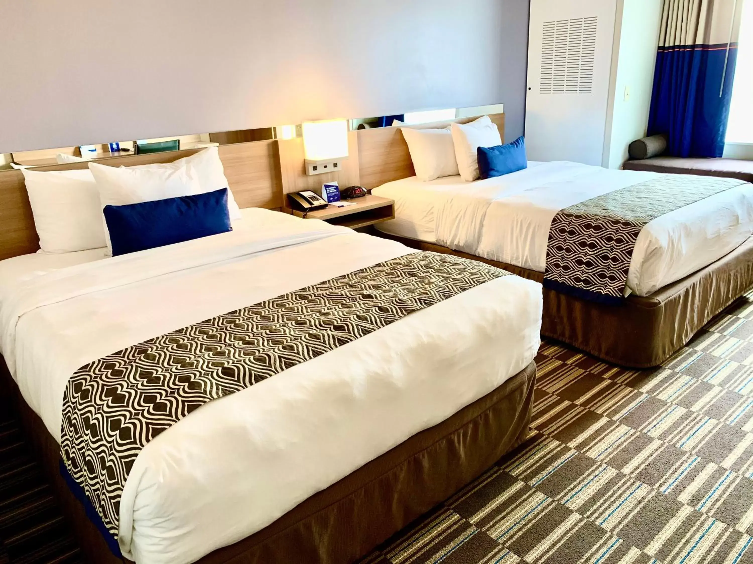 Bed in Microtel Inn & Suites by Wyndham Georgetown Delaware Beaches
