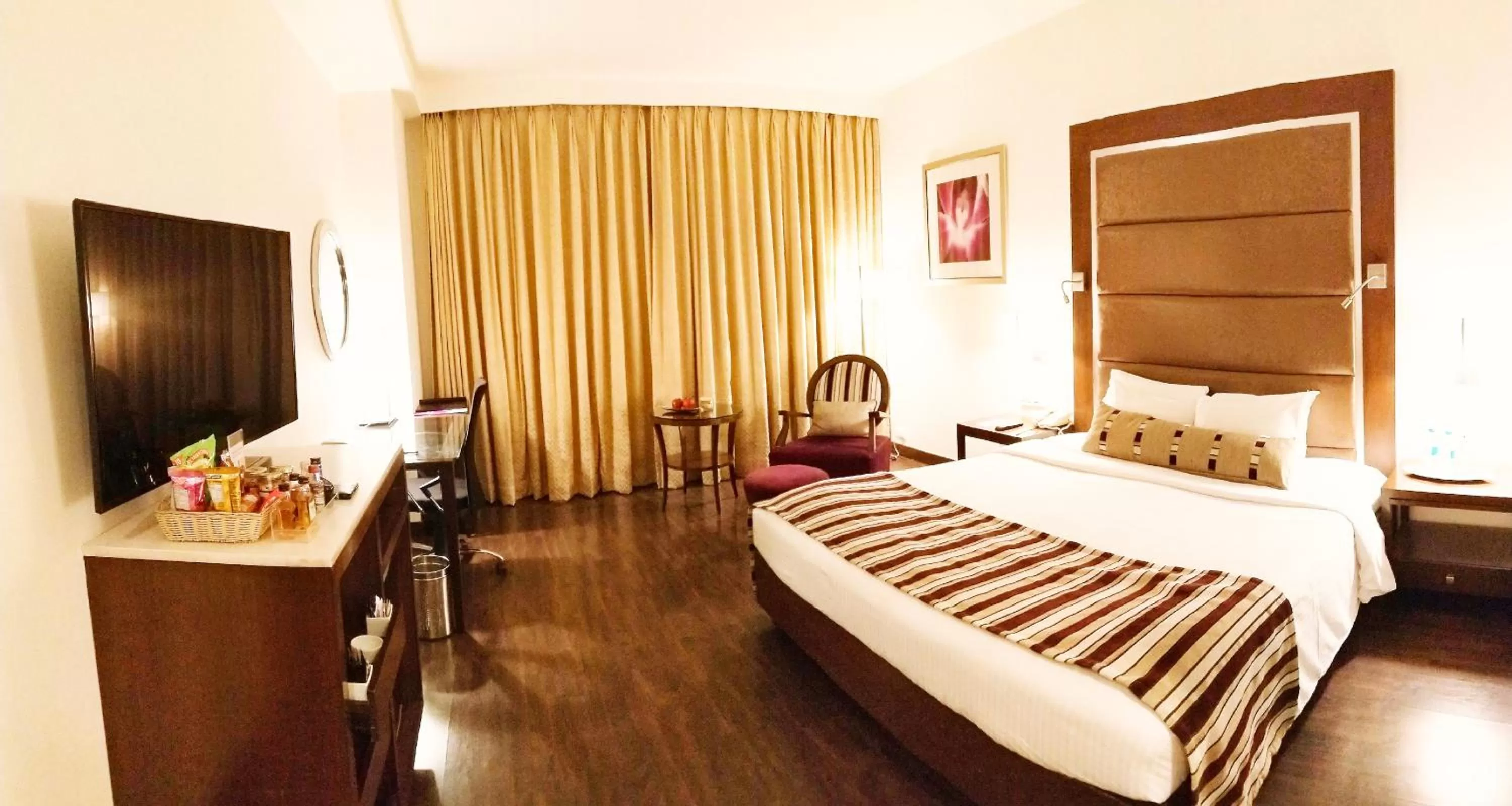 Photo of the whole room, Bed in Royal Orchid Central, Pune