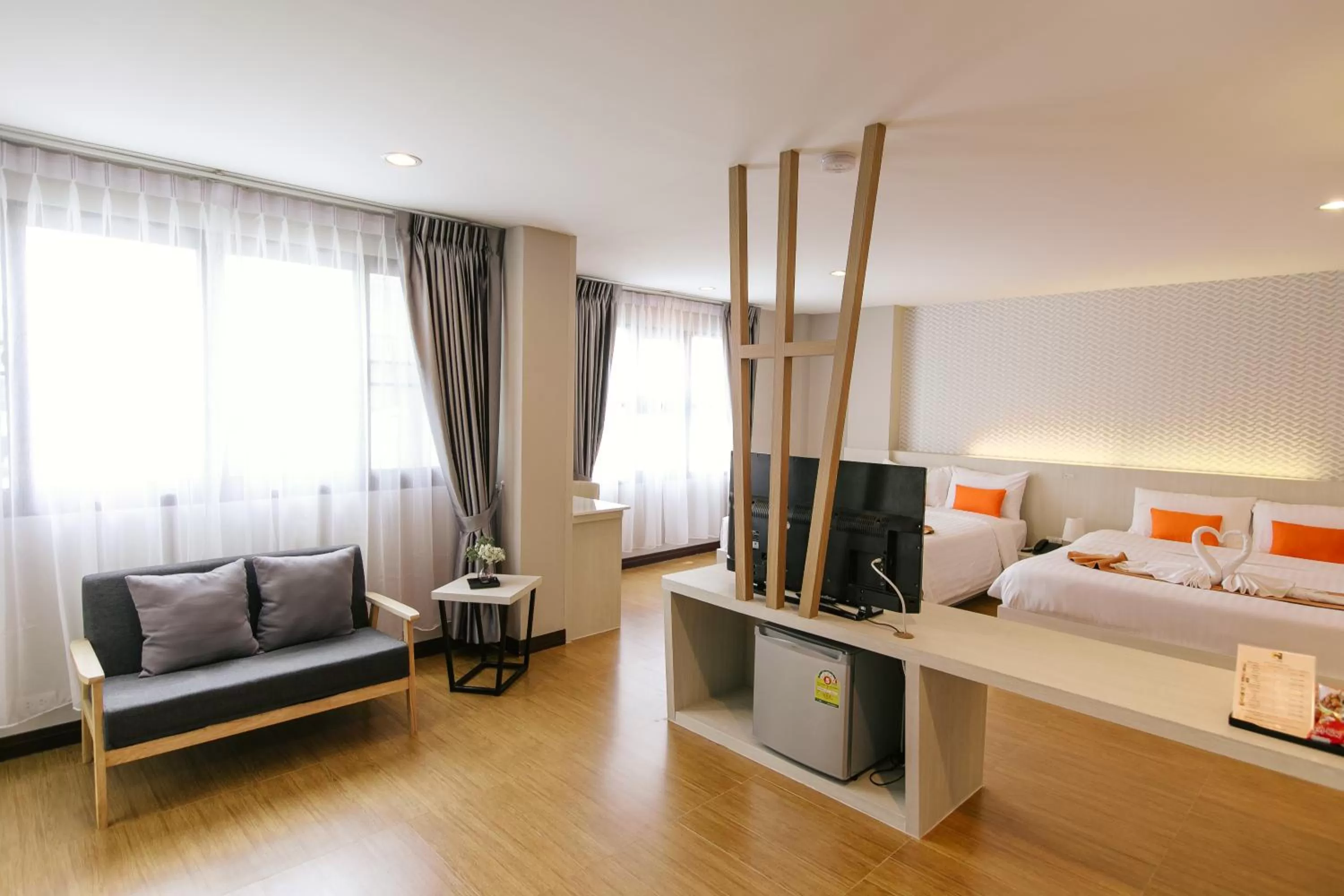 Communal lounge/ TV room, Bed in De Hug Hotel & Residence