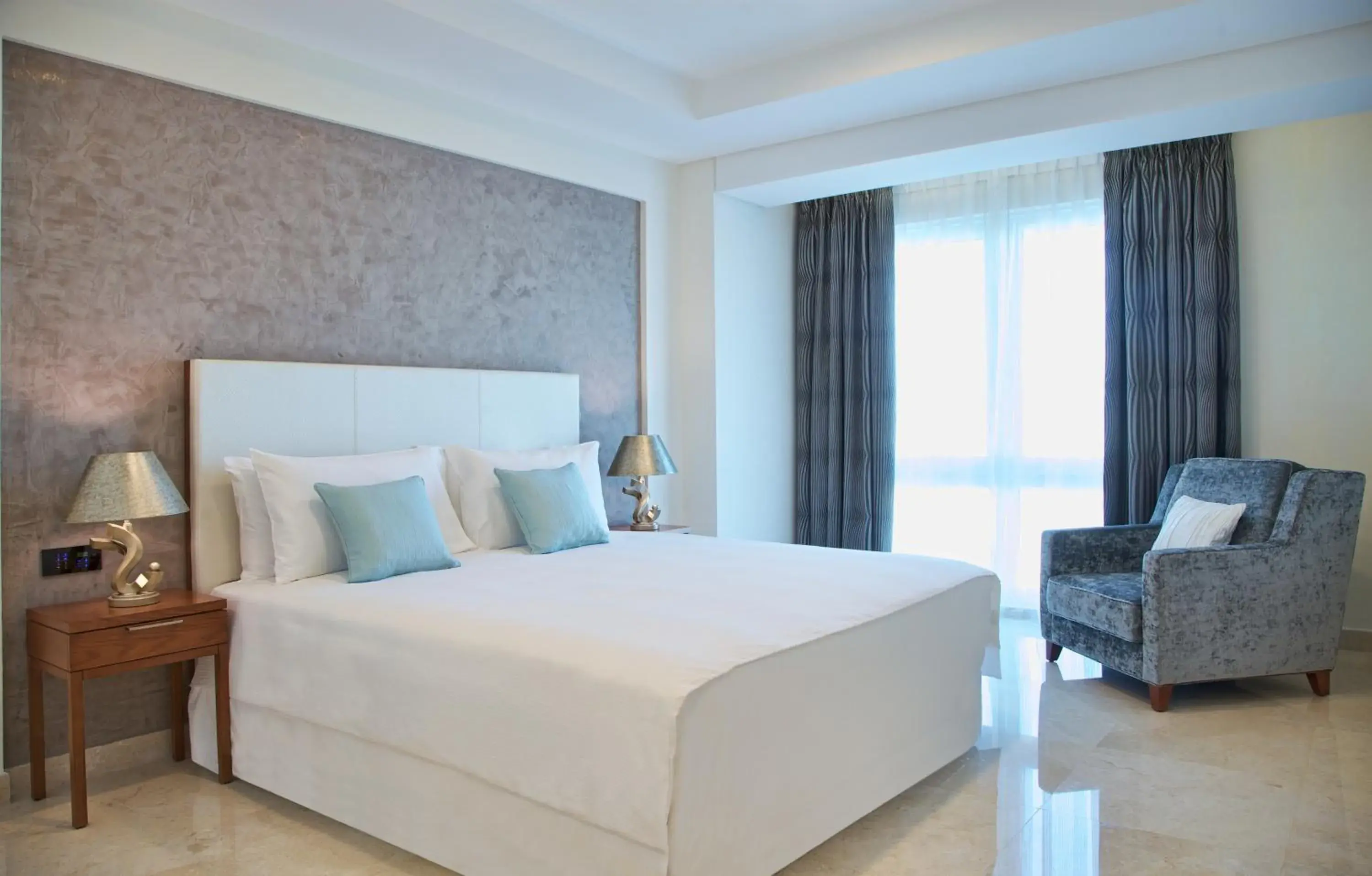 Bedroom, Bed in Millennium Executive Apartments Muscat