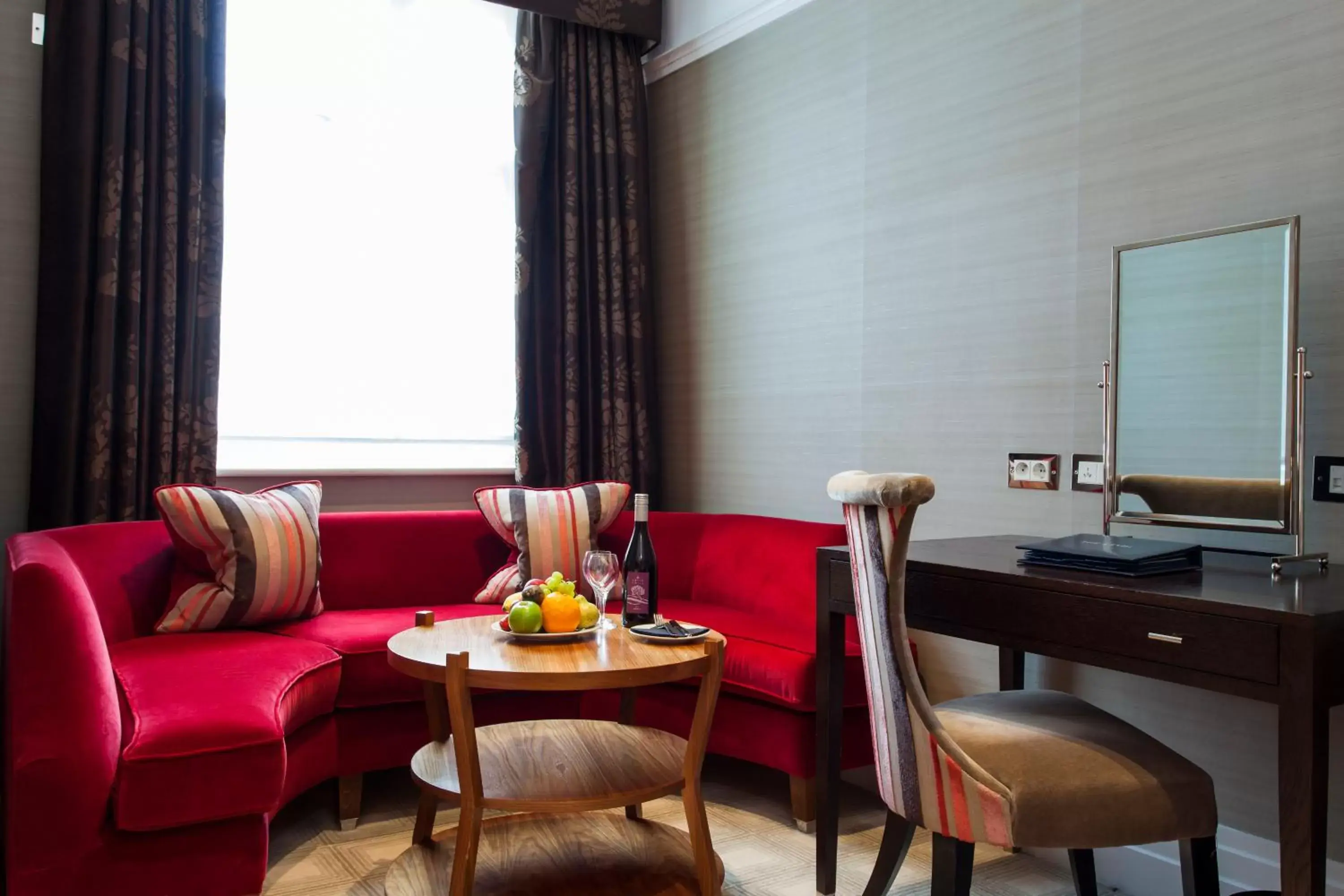 Living room, Seating Area in The Capital Hotel, Apartments & Townhouse