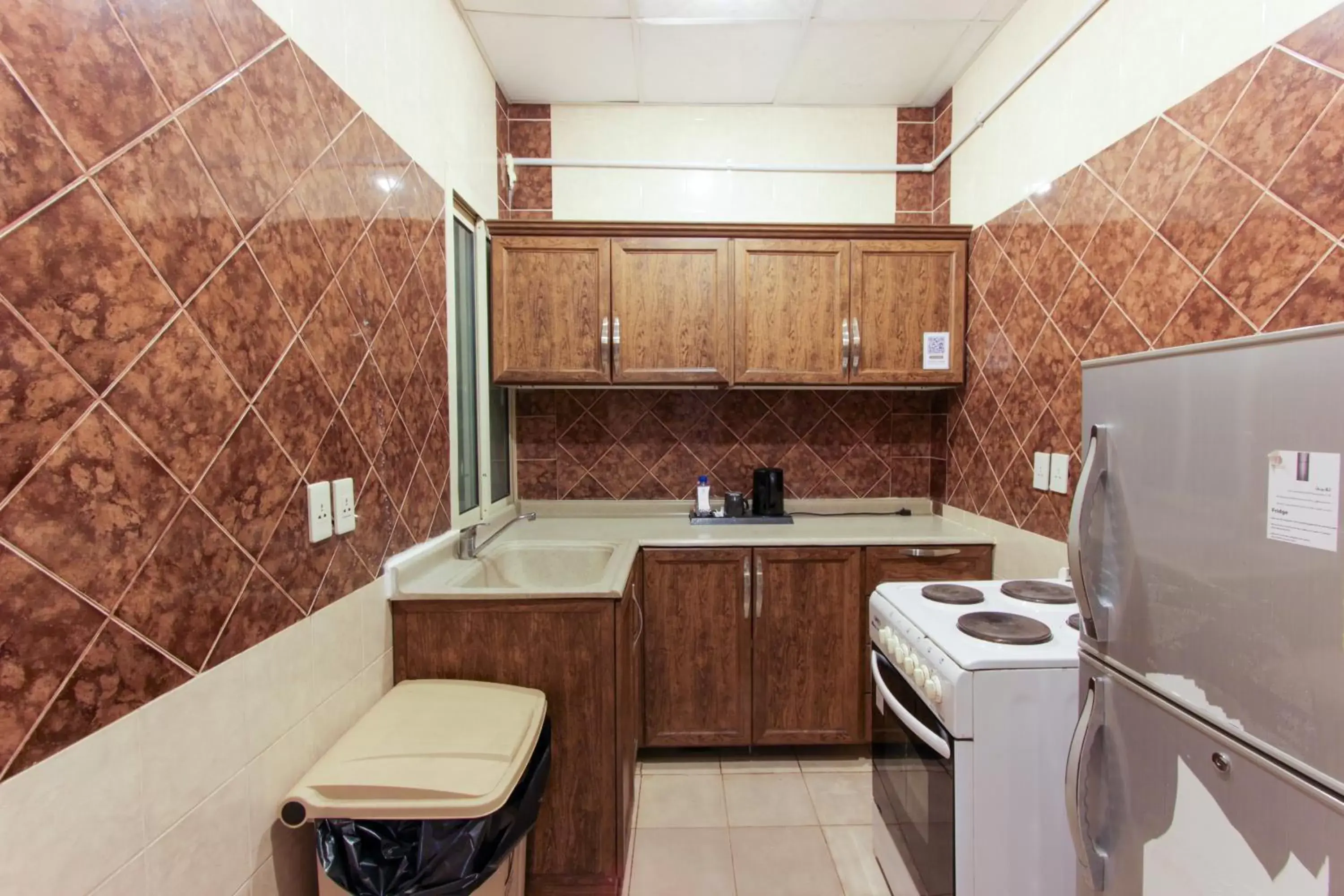 Kitchen or kitchenette, Kitchen/Kitchenette in Maskan Al Dyafah Hotel Apartments 2