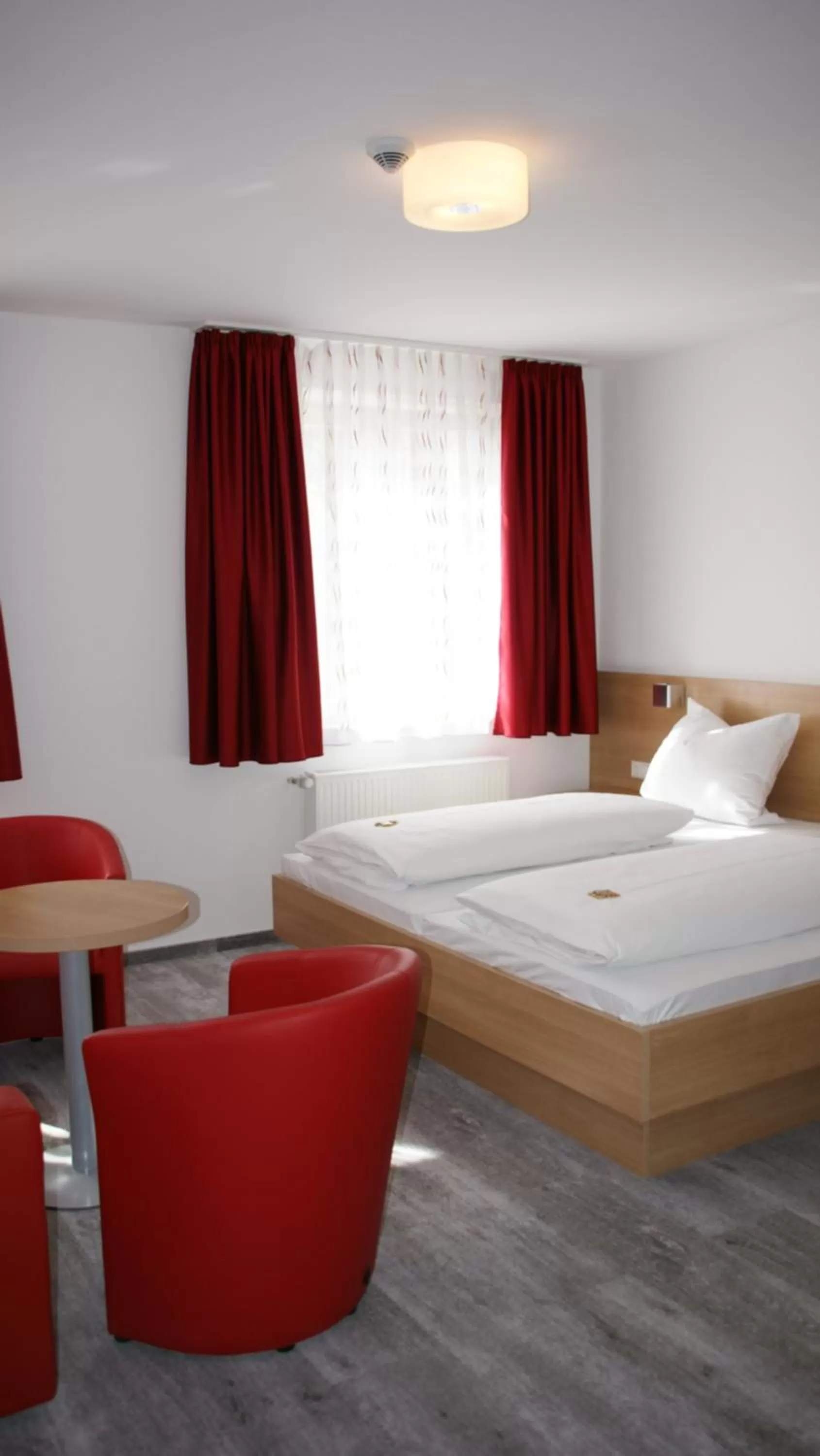 Living room, Bed in Hotel Engel