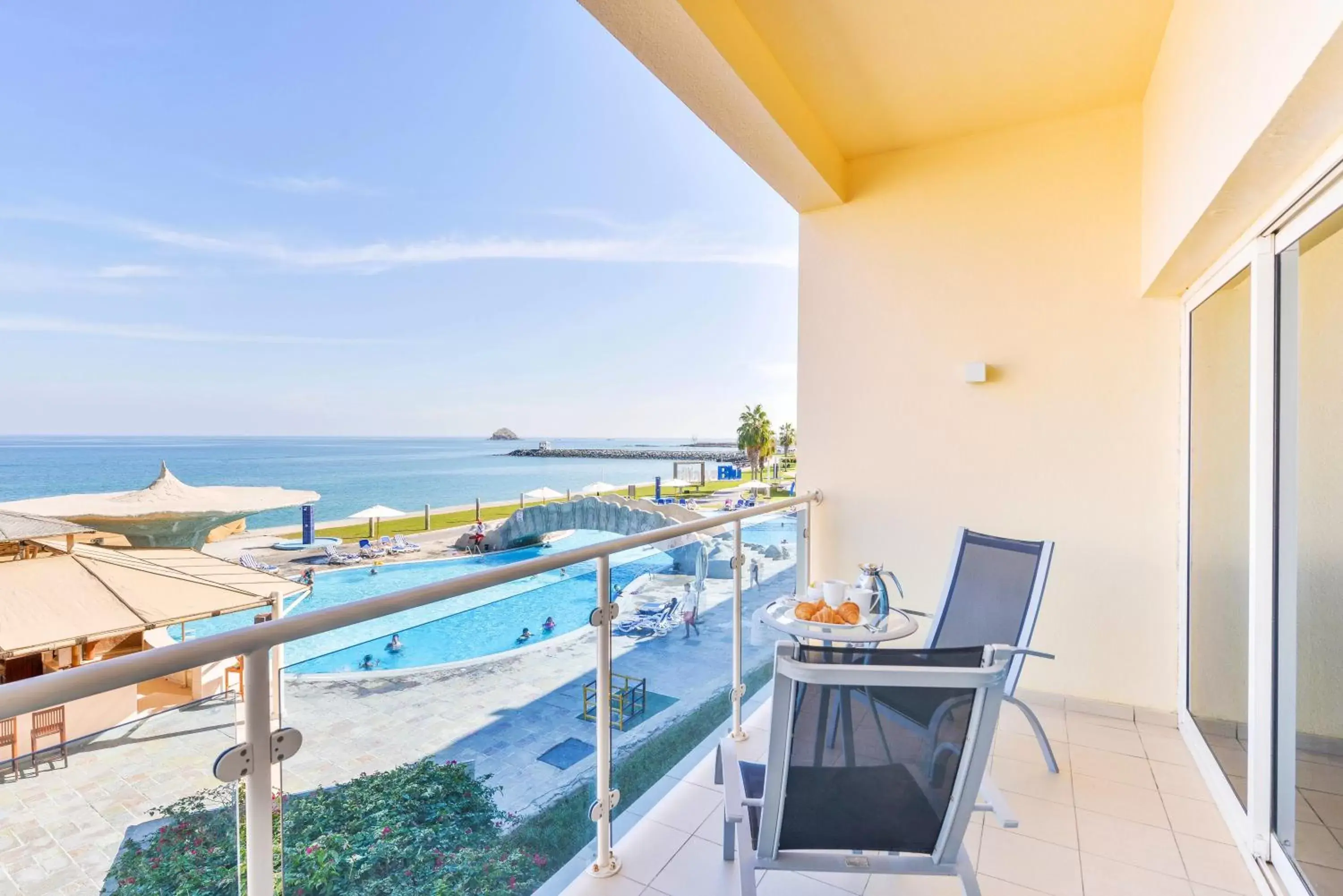 Balcony/Terrace, Pool View in Radisson Blu Resort, Fujairah