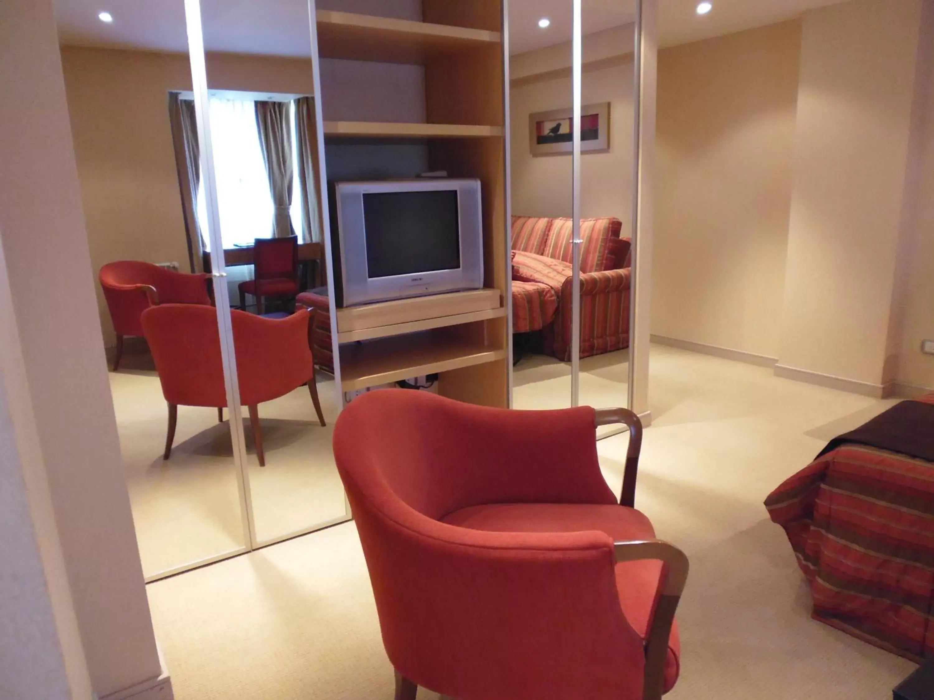 TV and multimedia, Seating Area in Fueguino Hotel