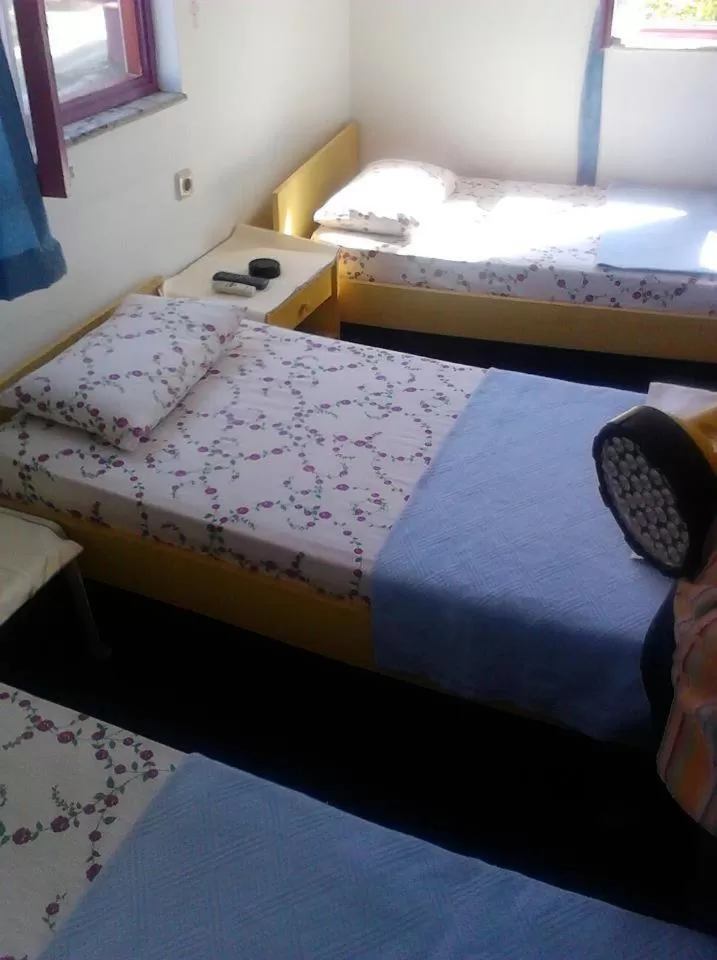 Bed in Sunrise Hotel