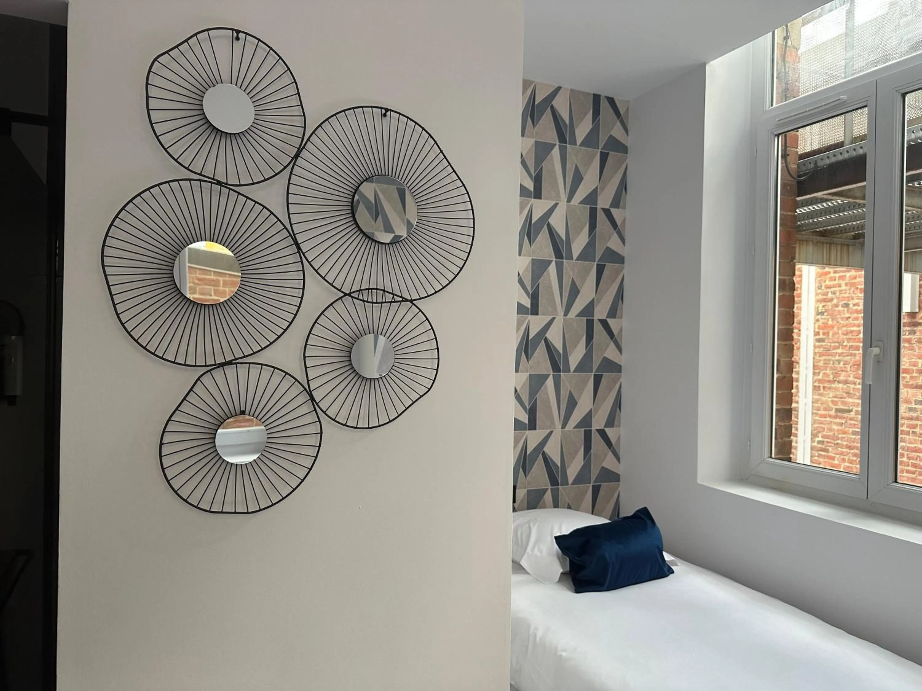 Bed in Hôtel Le Dormeur du Val