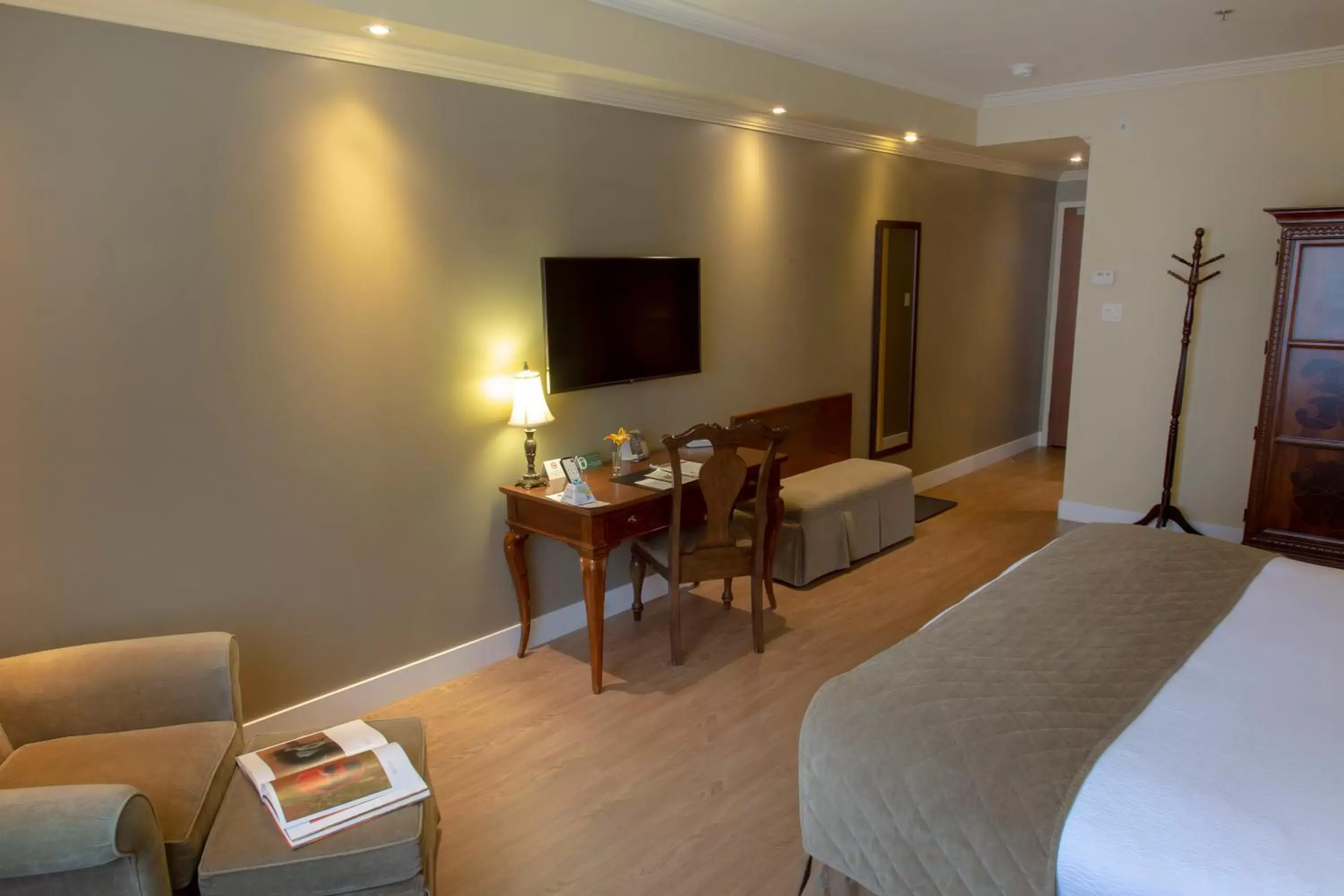 Photo of the whole room, TV/Entertainment Center in Hotel Brossard