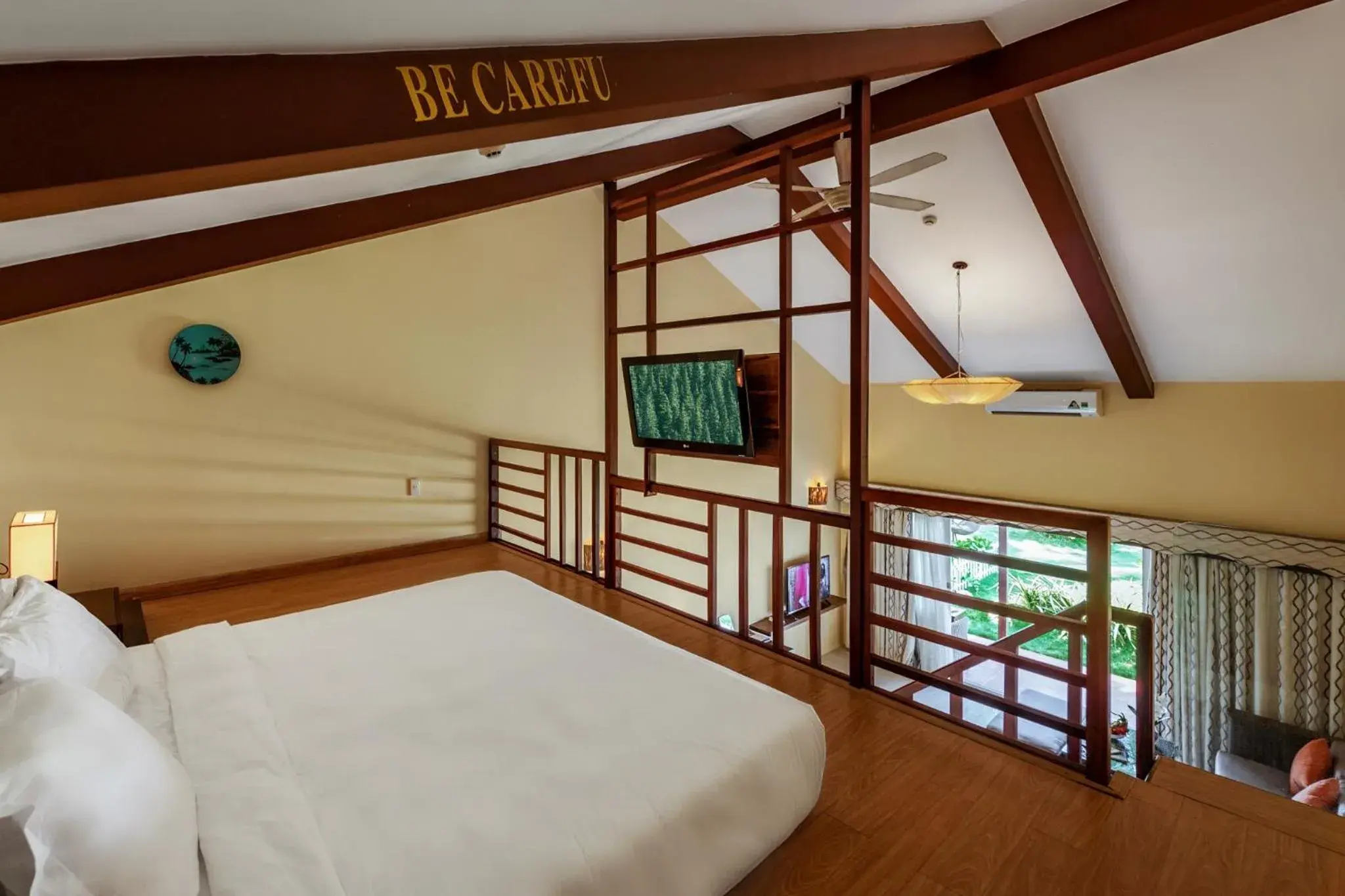 Bed in Famiana Resort & Spa