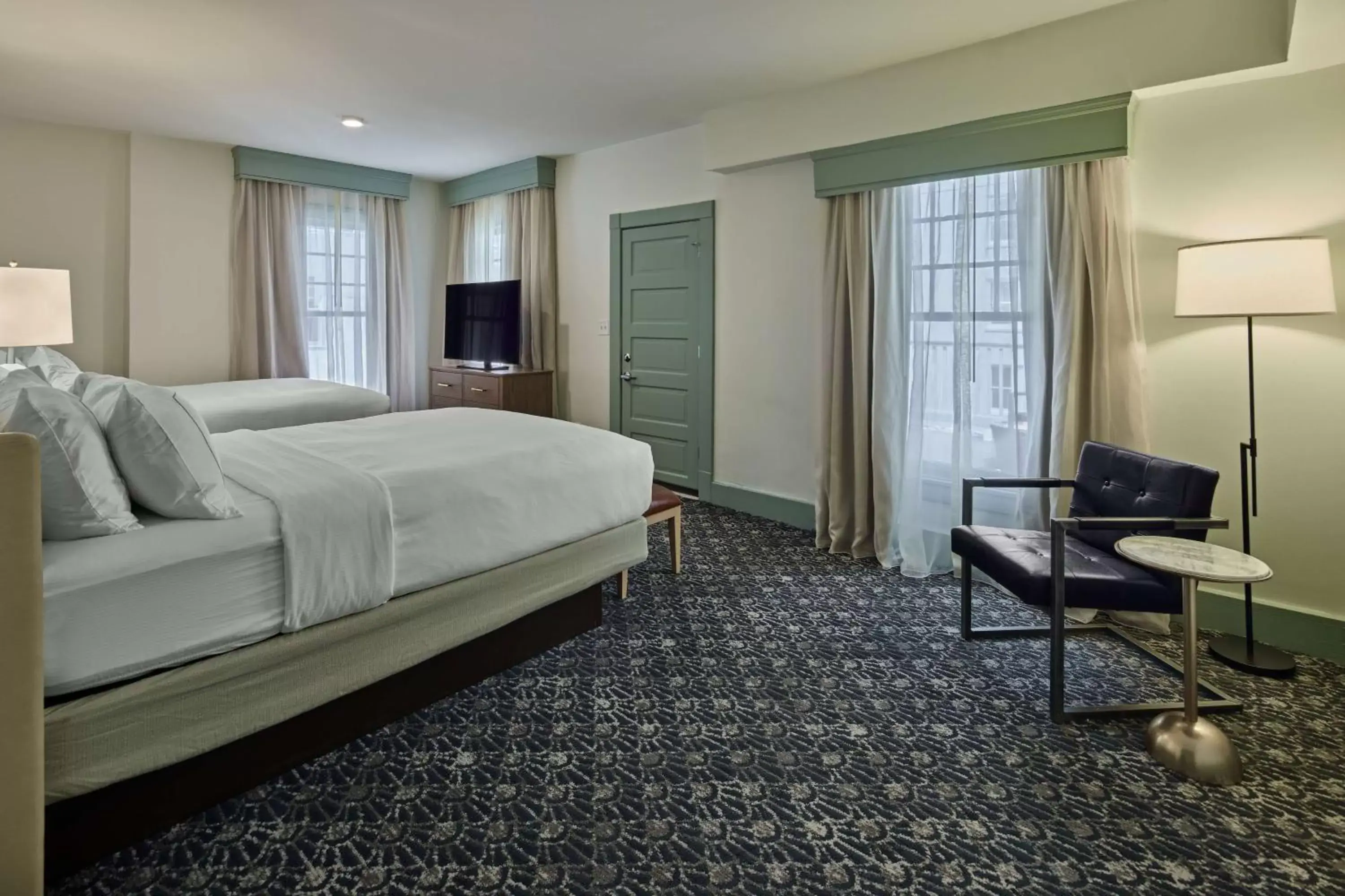 Bed, Seating Area in The Partridge Inn Augusta, Curio Collection by Hilton