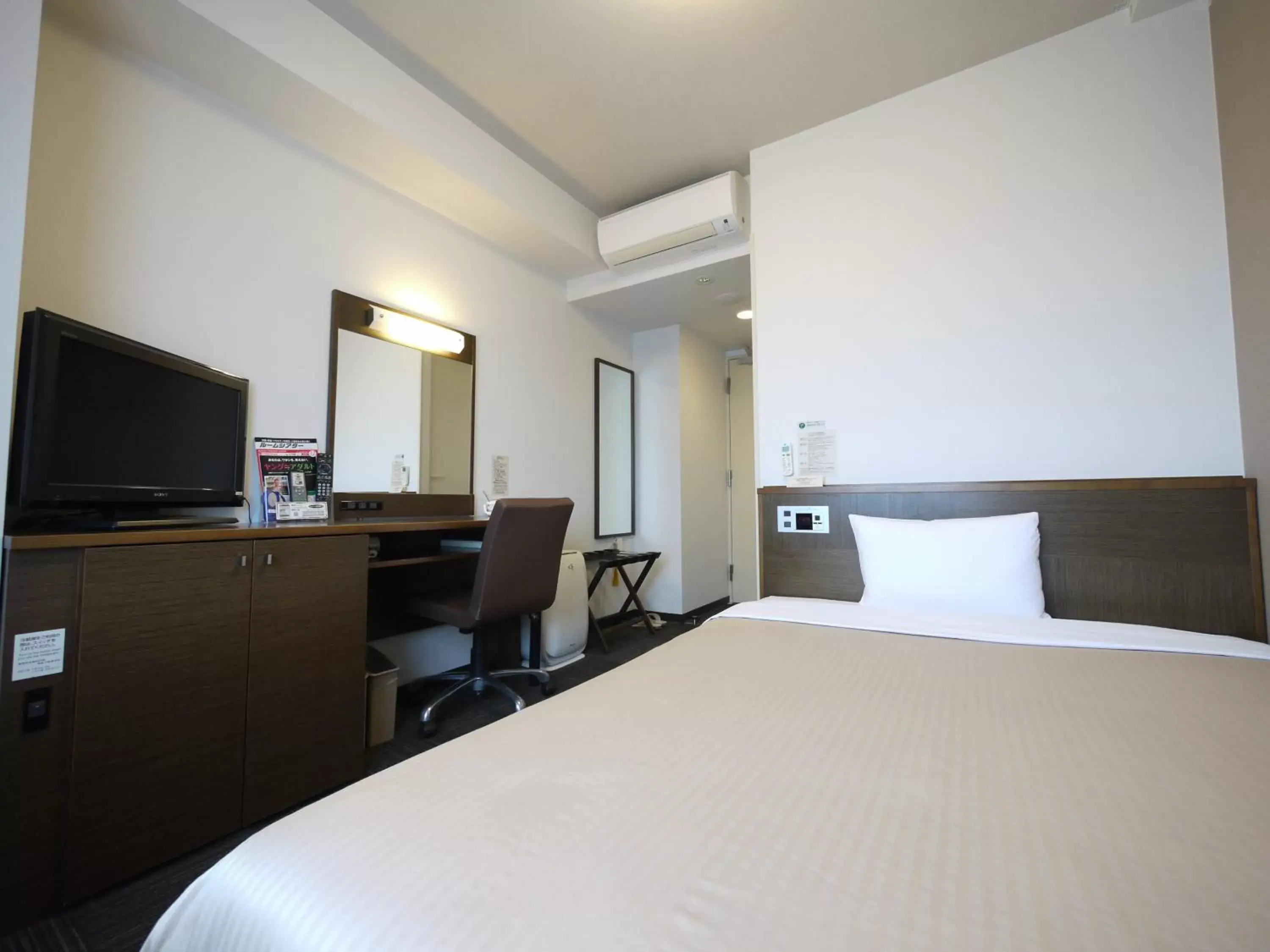 Bed in Hotel Route-Inn Ishinomaki Kanan Inter