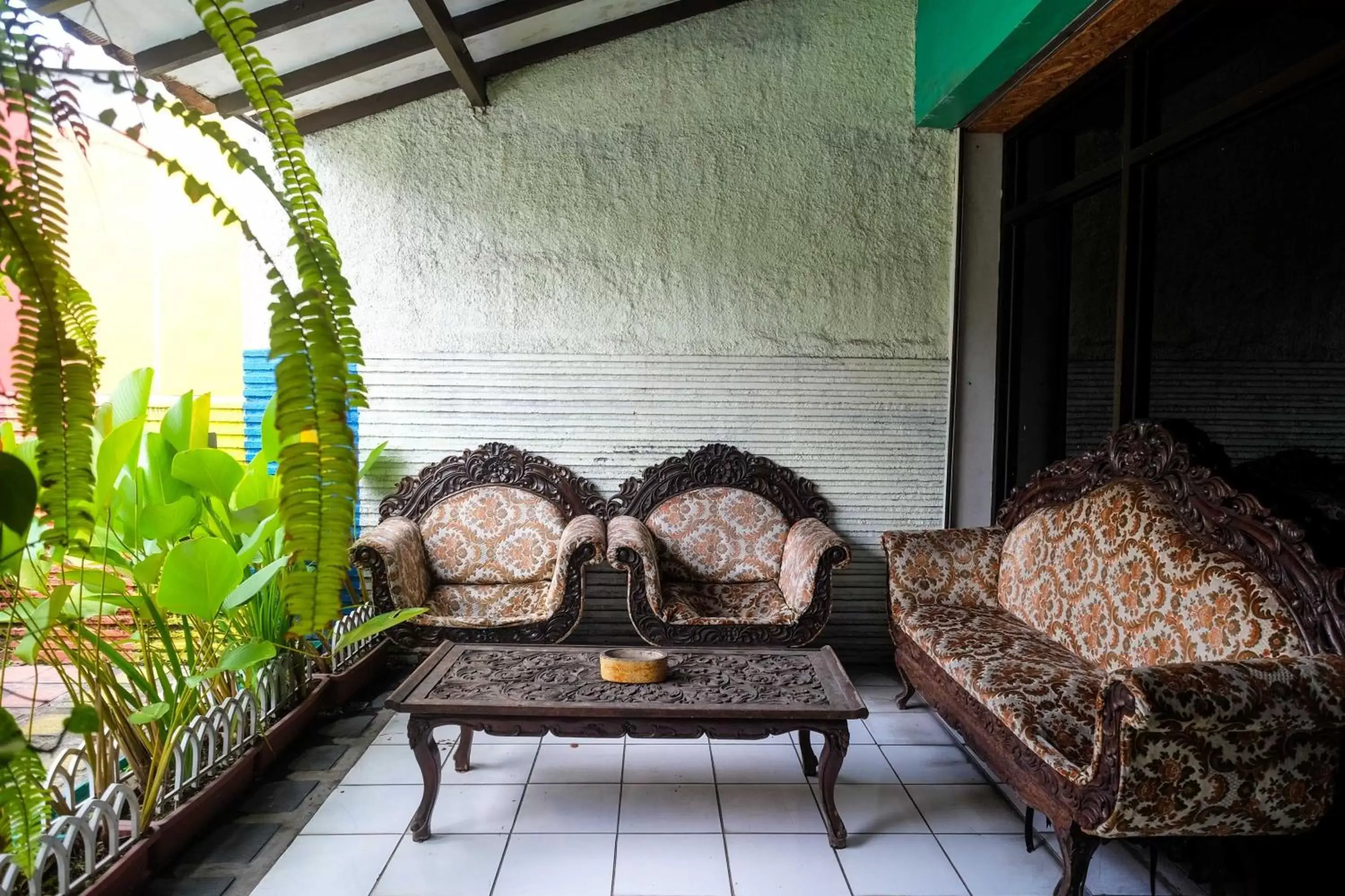 Living room, Seating Area in RedDoorz near Lotte Mart Maguwoharjo Yogyakarta