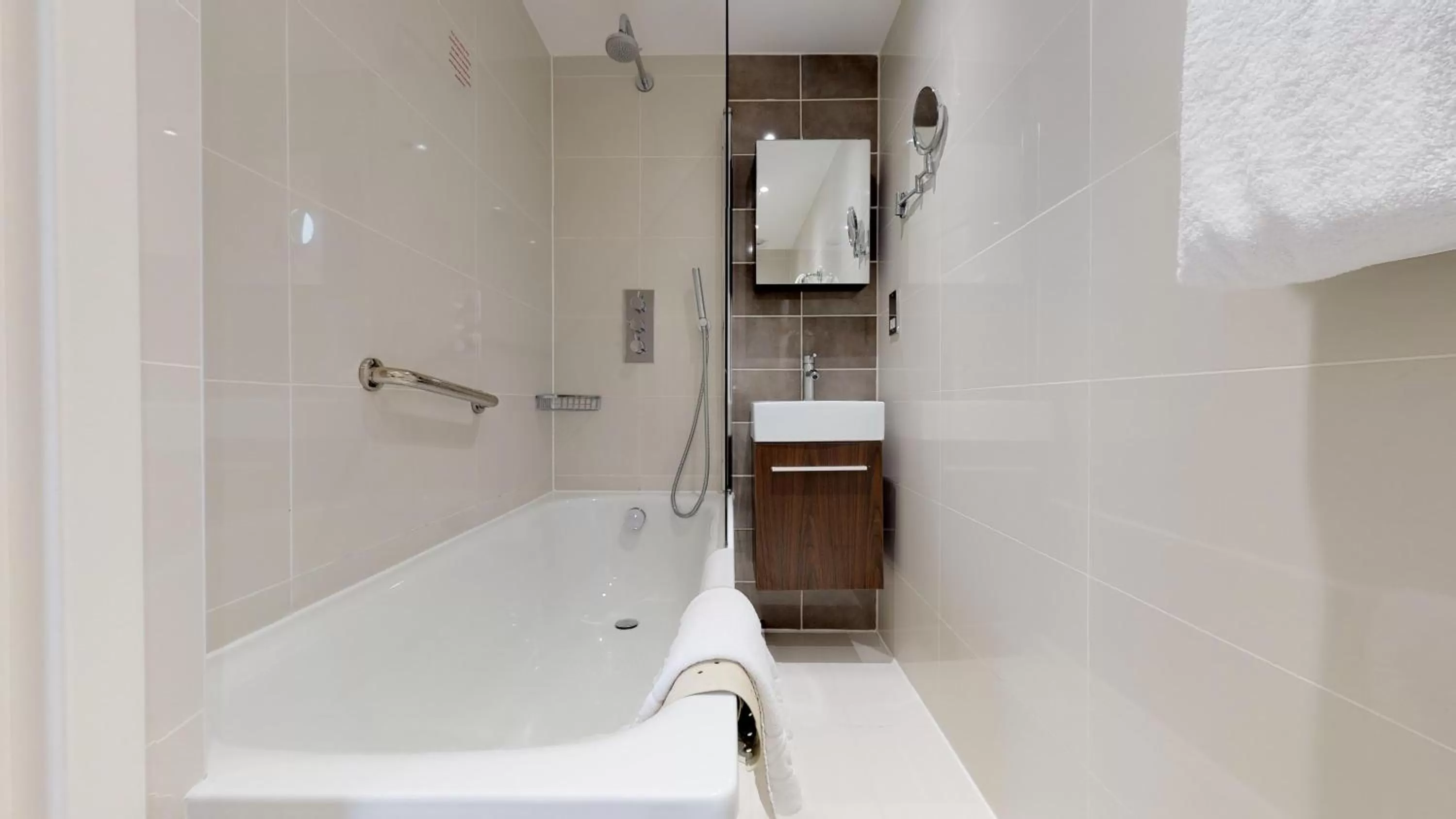 Bathroom in Holiday Inn London Kensington High St. by IHG