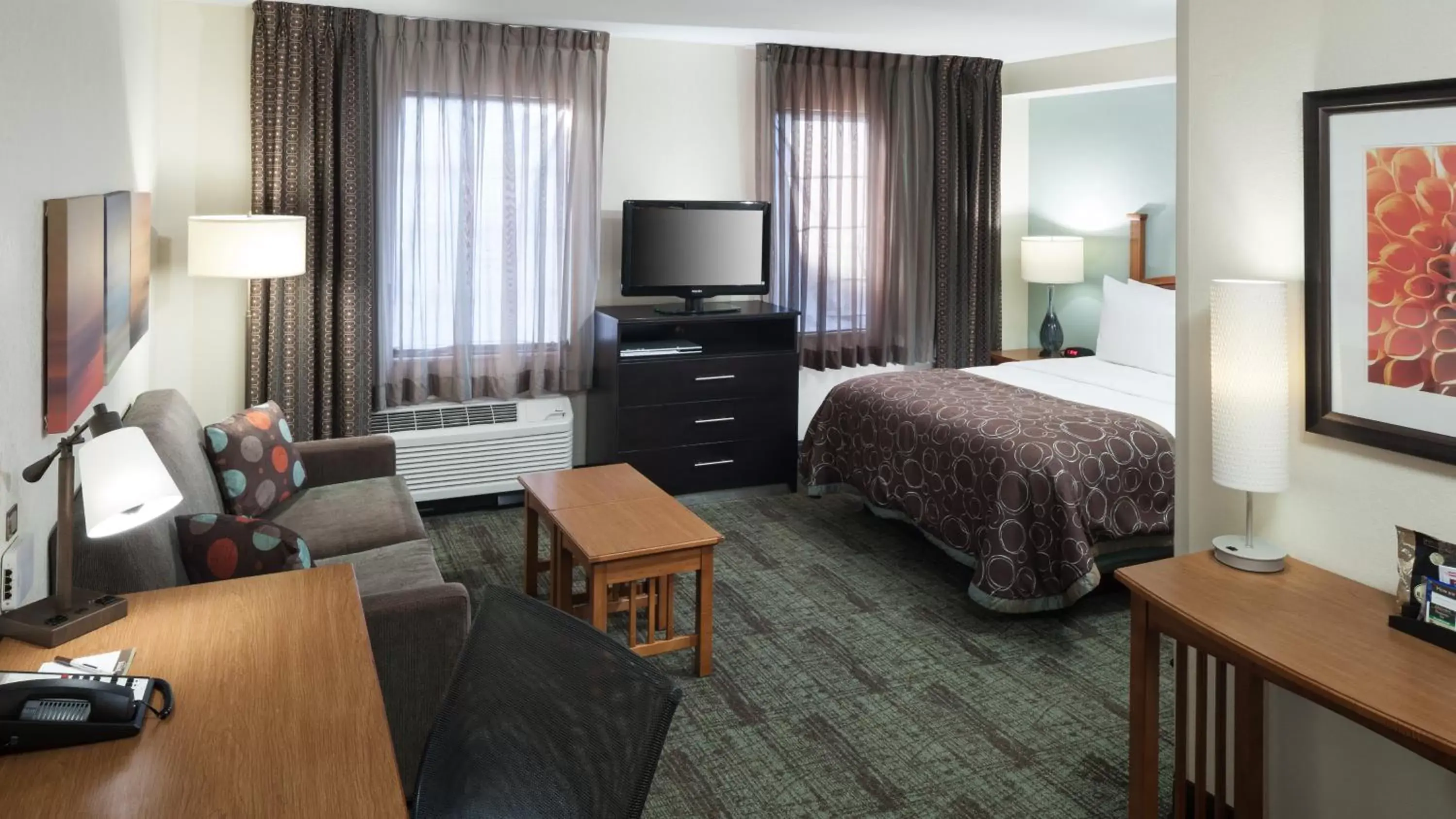 Photo of the whole room, TV/Entertainment Center in Staybridge Suites Jackson, an IHG Hotel