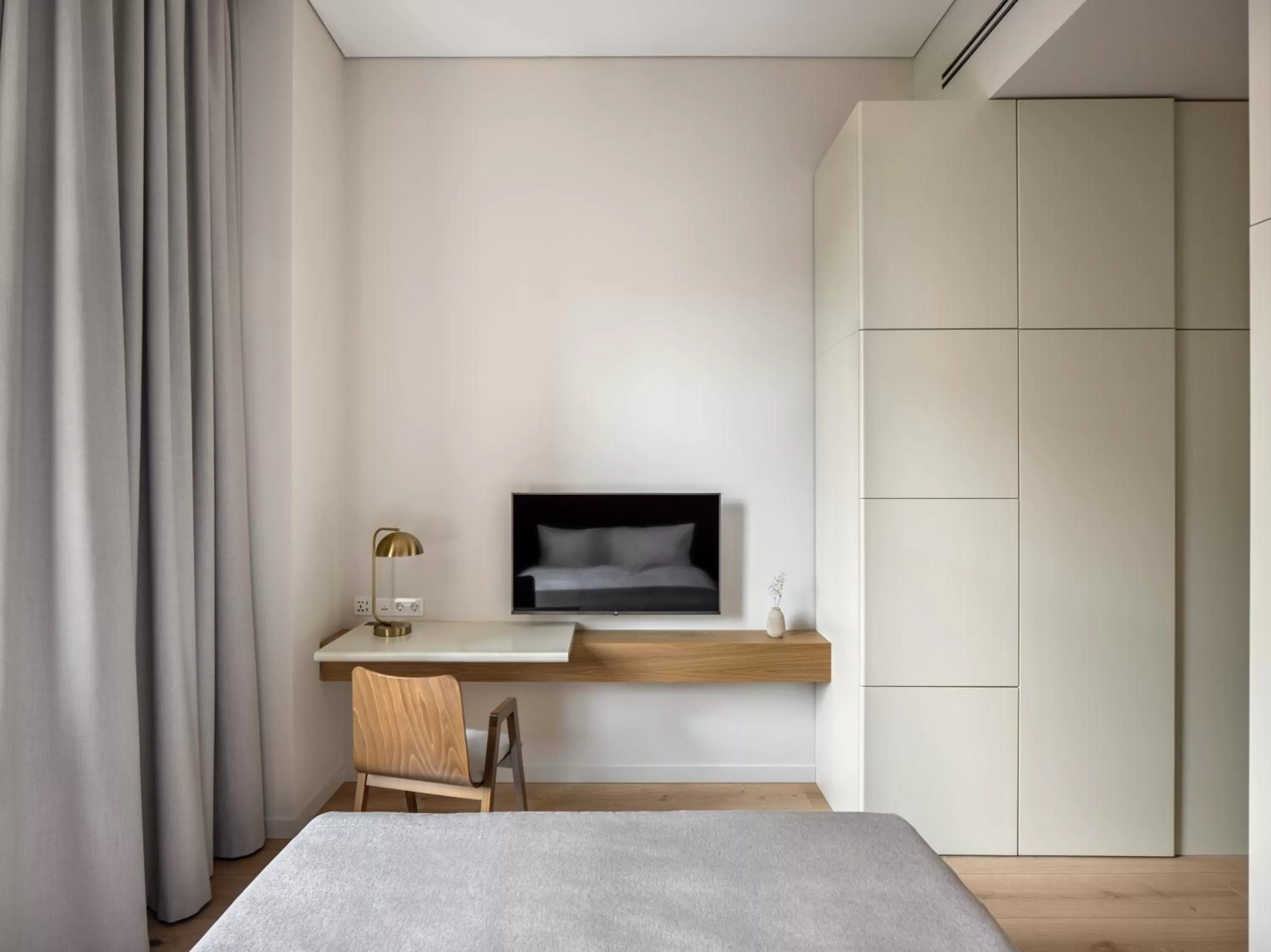 Bed, TV/Entertainment Center in Sophia Hotel Kyiv