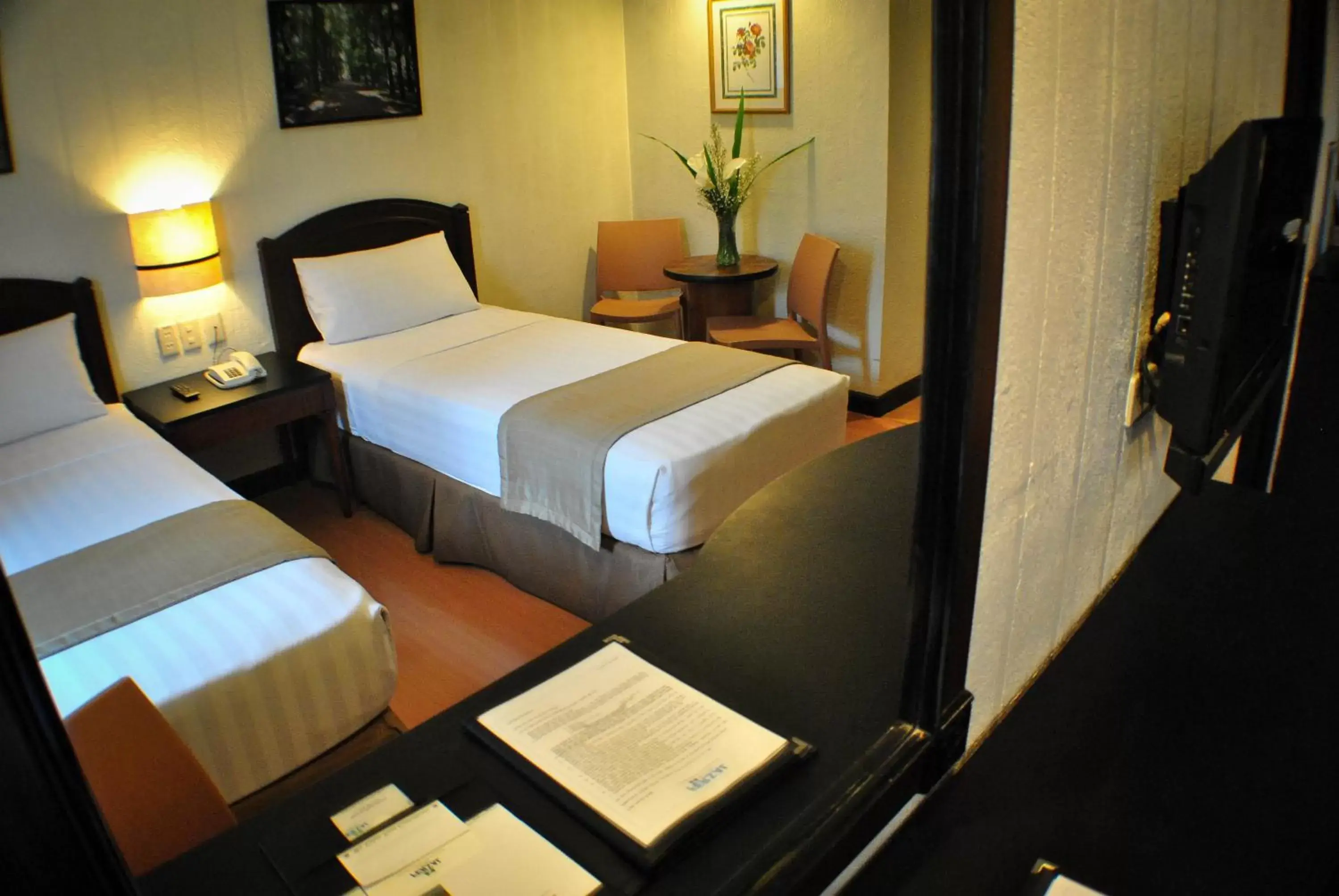 Bed in Fersal Hotel Neptune Makati