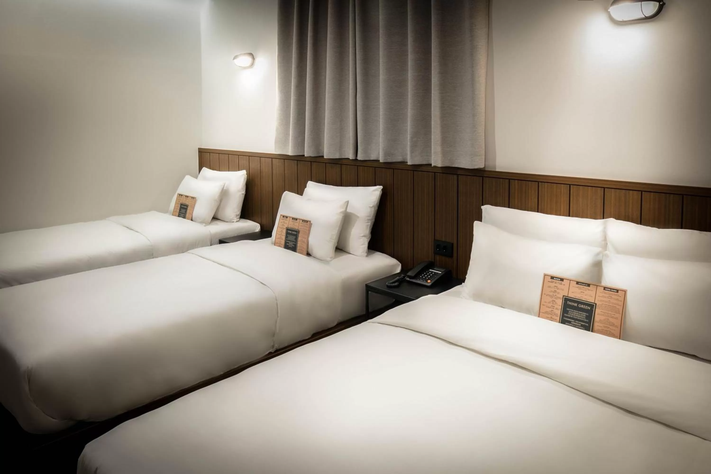 Bed in Hotel Lumia Myeongdong