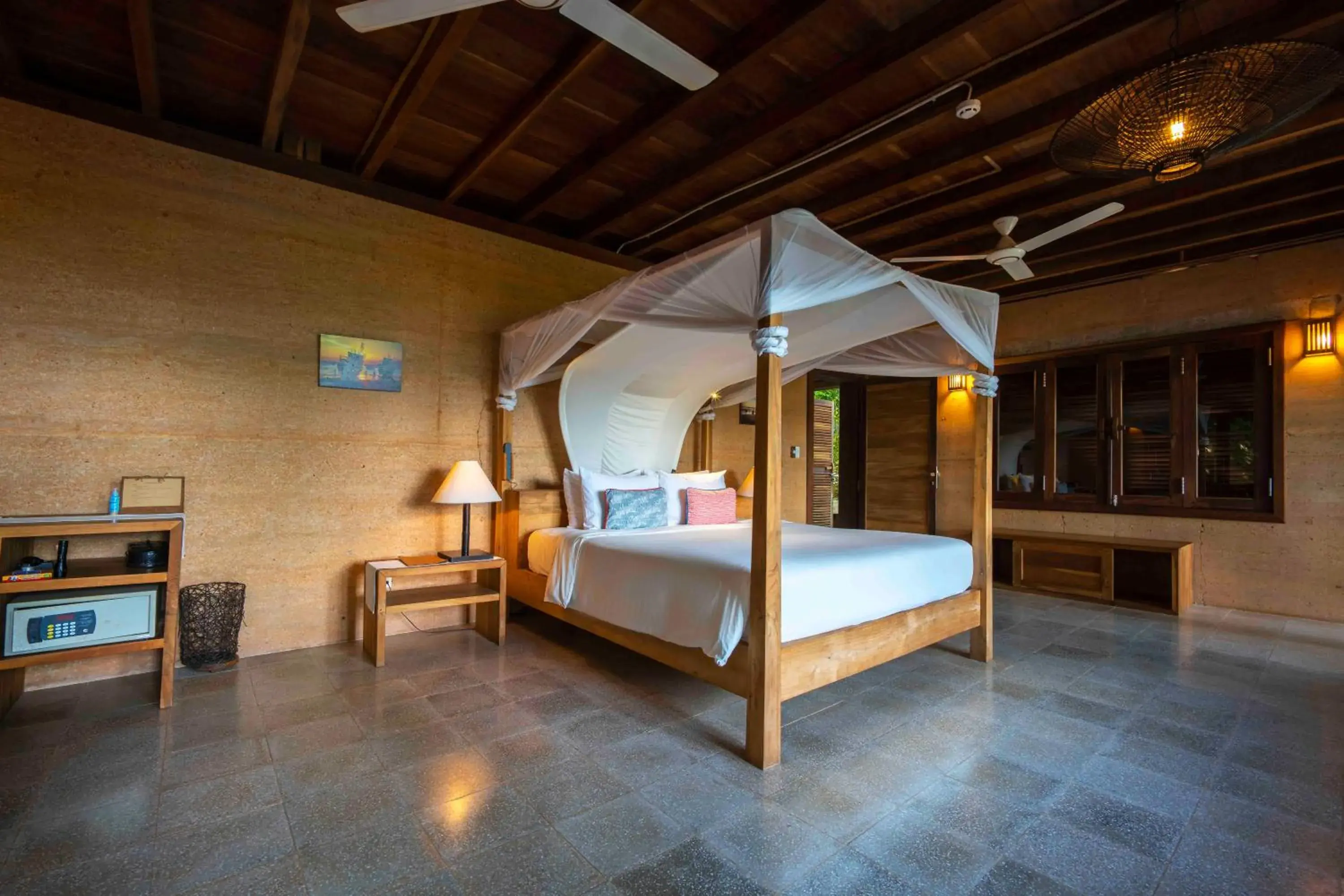 Bed in Mango Bay Resort