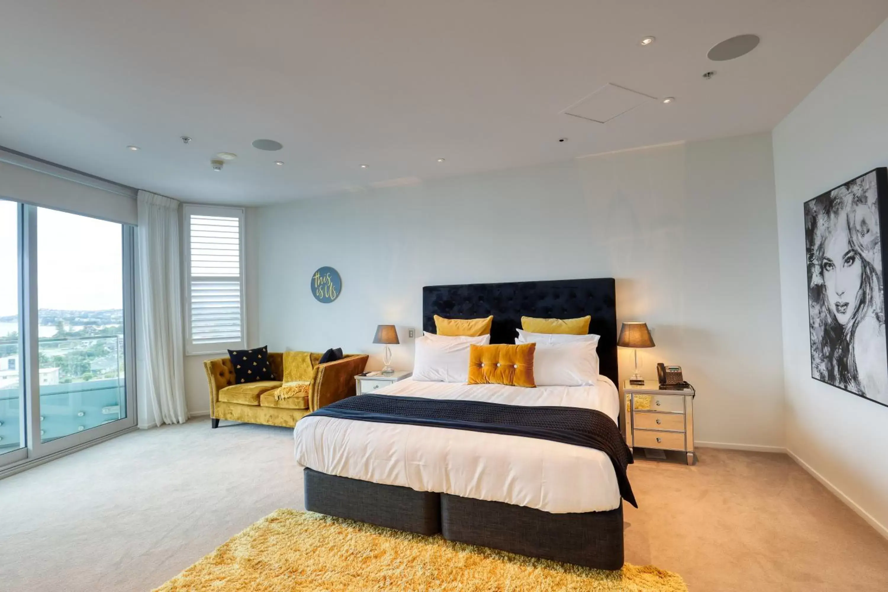 Bedroom in Ramada Suites by Wyndham Nautilus Orewa