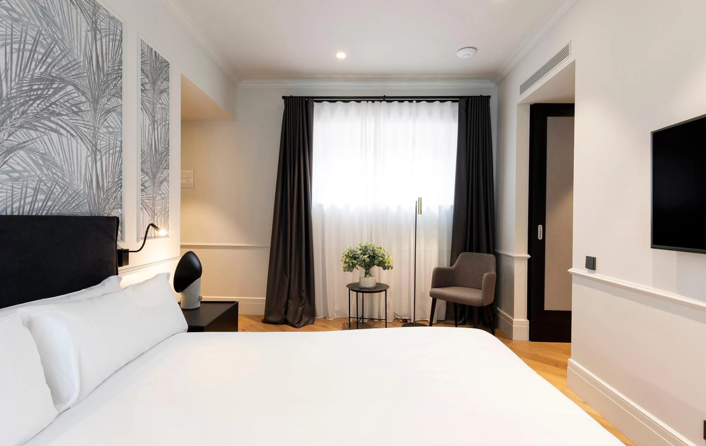 Bed in Maldà Singular Hotel