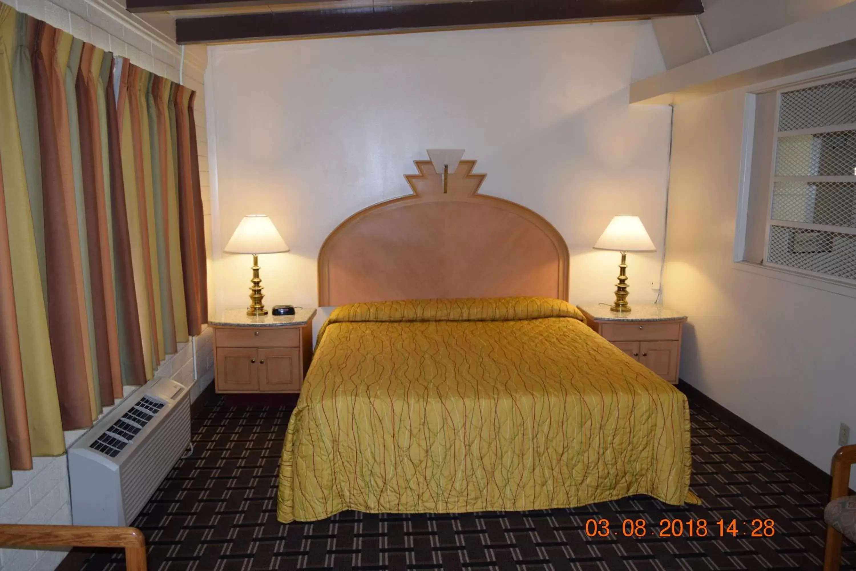 Bed in Stanlunds Inn and Suites