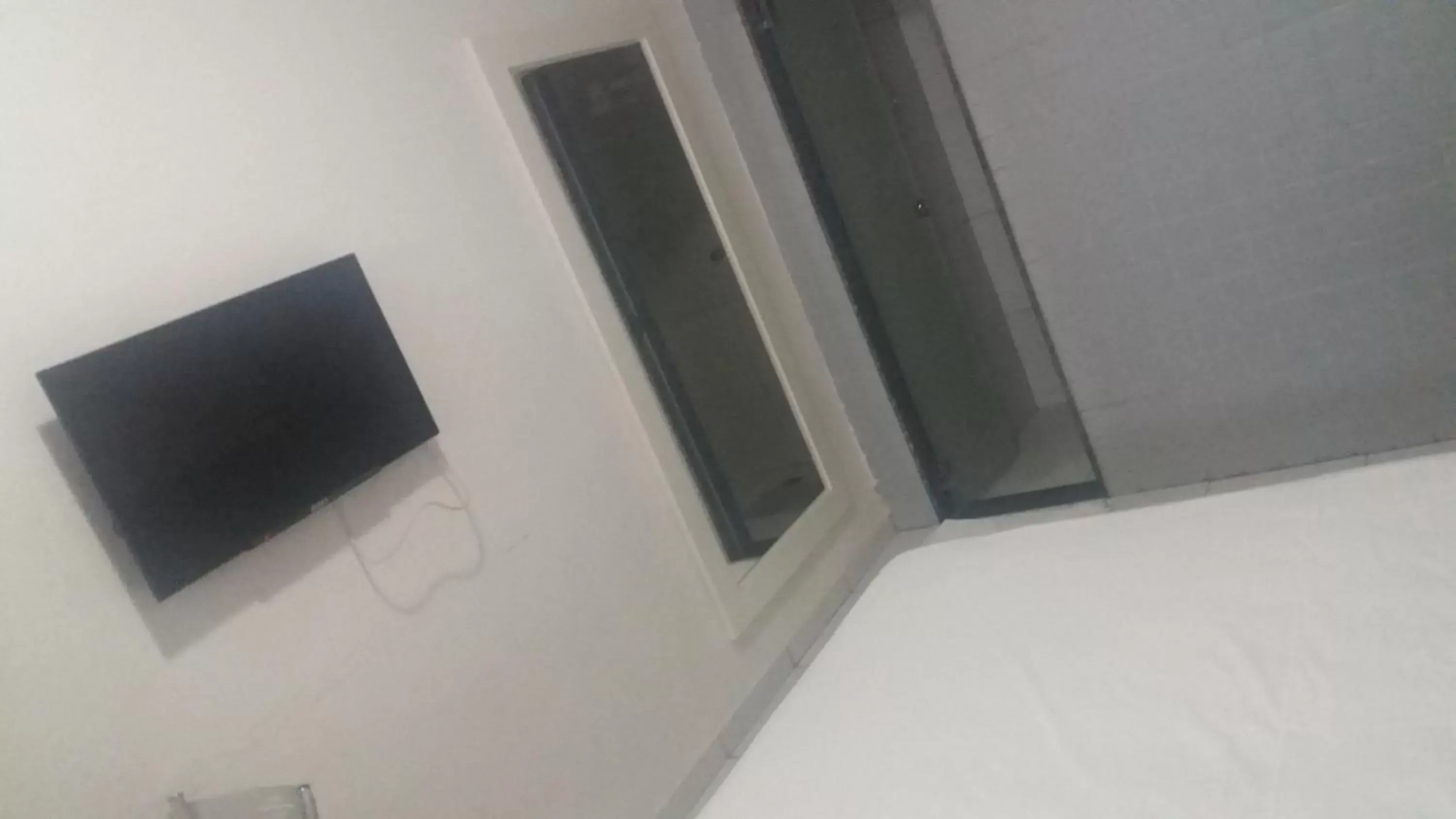 Standard Triple Room in Sambura Hotel Standard Triple Room in Sambura Hotel