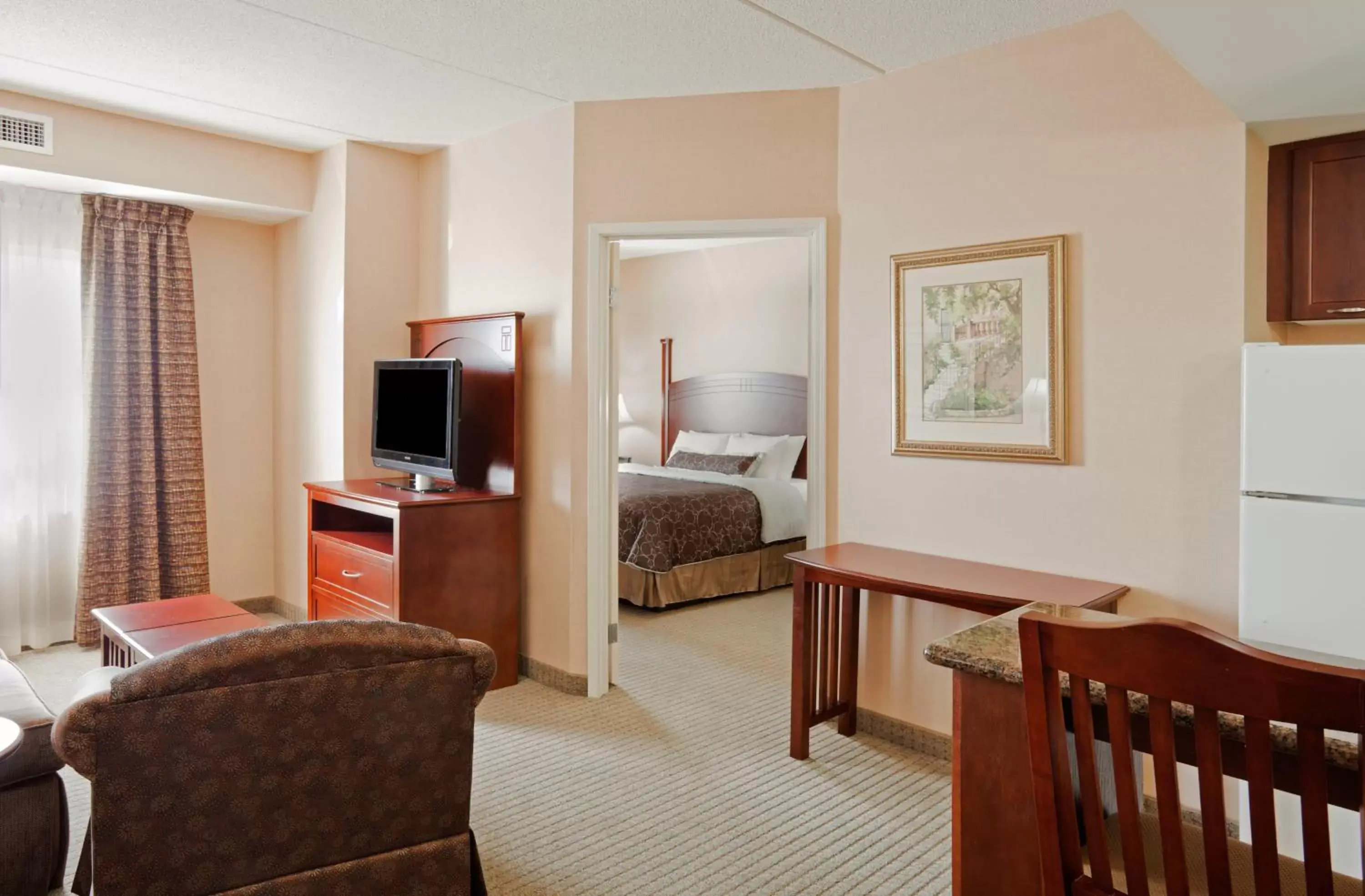 Photo of the whole room, TV/Entertainment Center in Staybridge Suites Oakville Burlington, an IHG Hotel