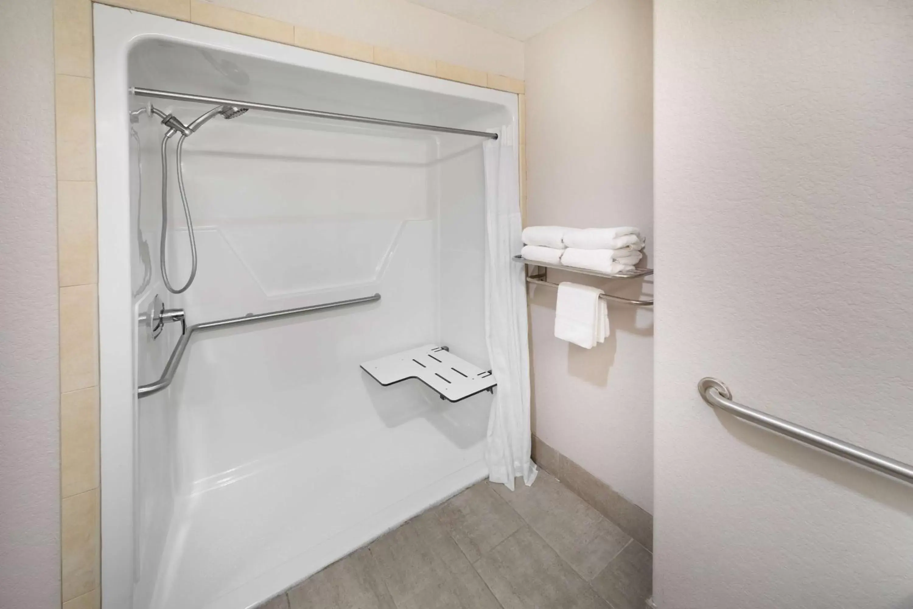 Bathroom in Days Inn & Suites by Wyndham San Antonio near AT&T Center