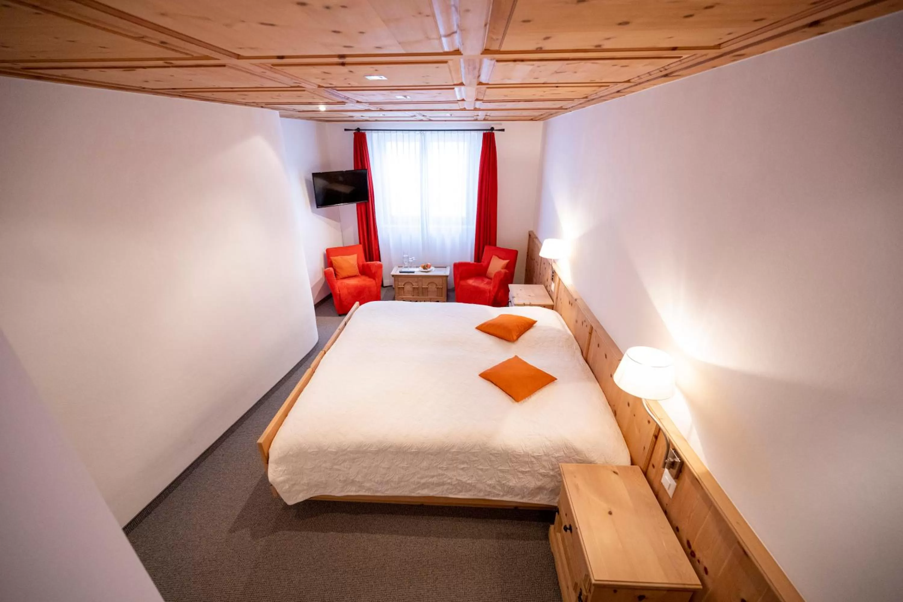 Bed in Hotel Engiadina