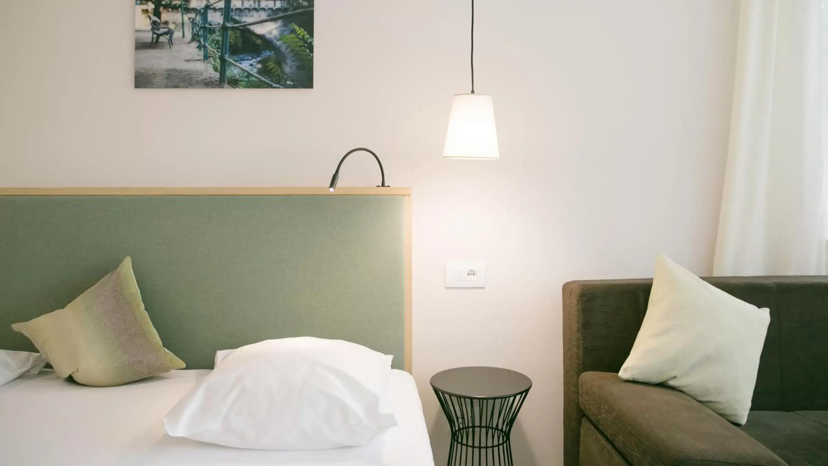 Decorative detail, Bed in Flora Hotel & Suites