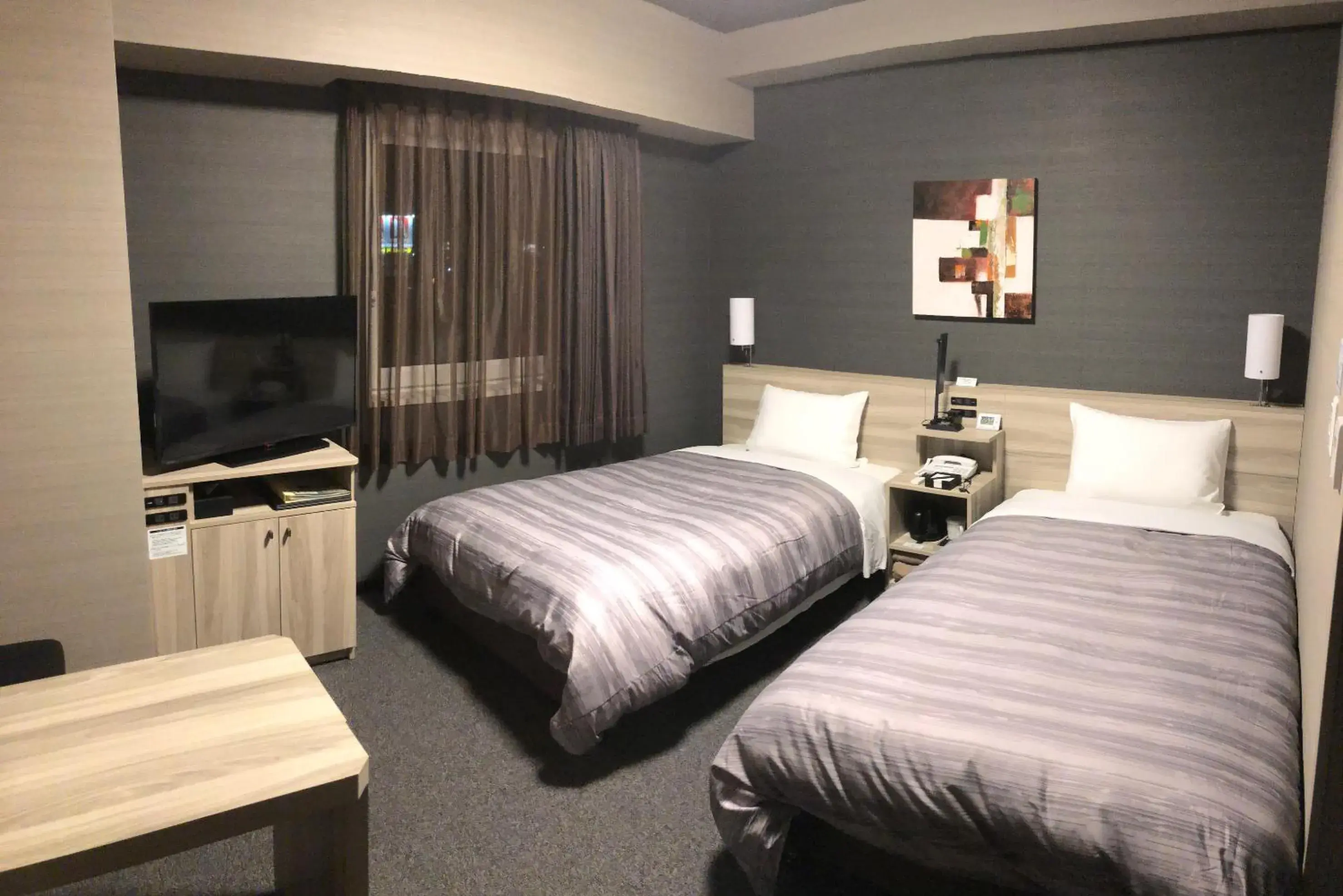 Bed in Hotel Route-Inn Grand Muroran