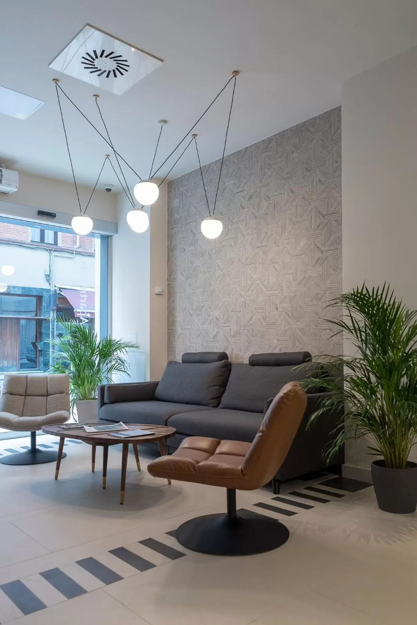 Lobby or reception in Bilbao City Center by abba Suites Lobby or reception in Bilbao City Center by abba Suites