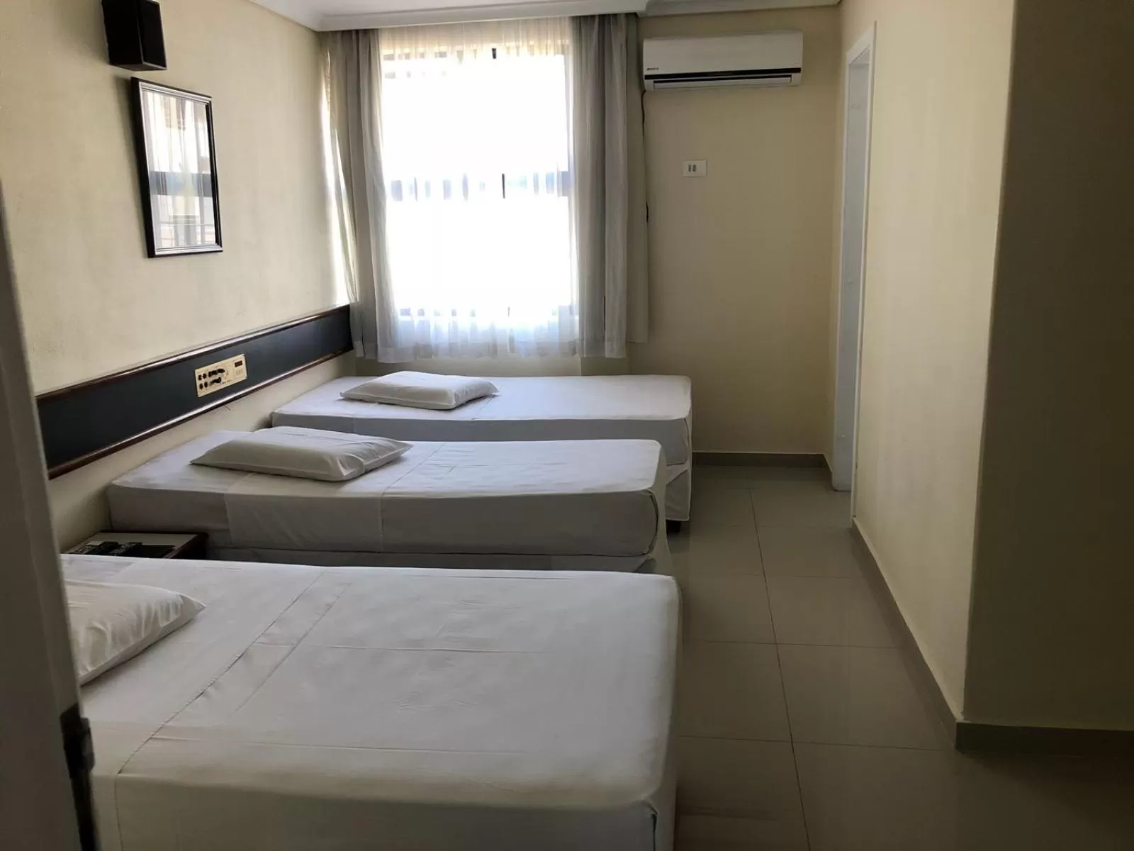 Bed in Hotel Estação Express