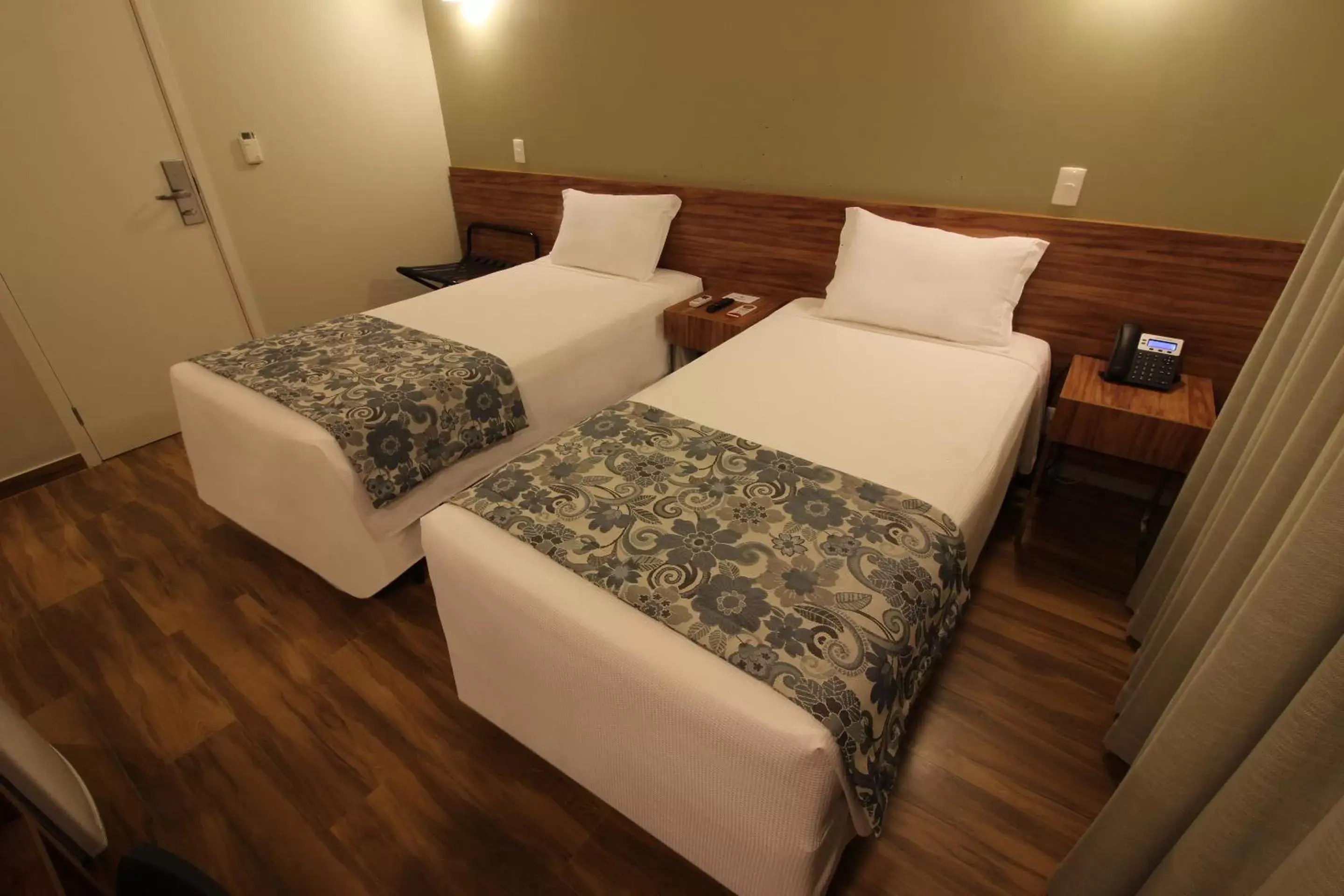 Bed in Impar Suites Barao de Cocais