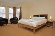 Bedroom in All Seasons Lodge Hotel