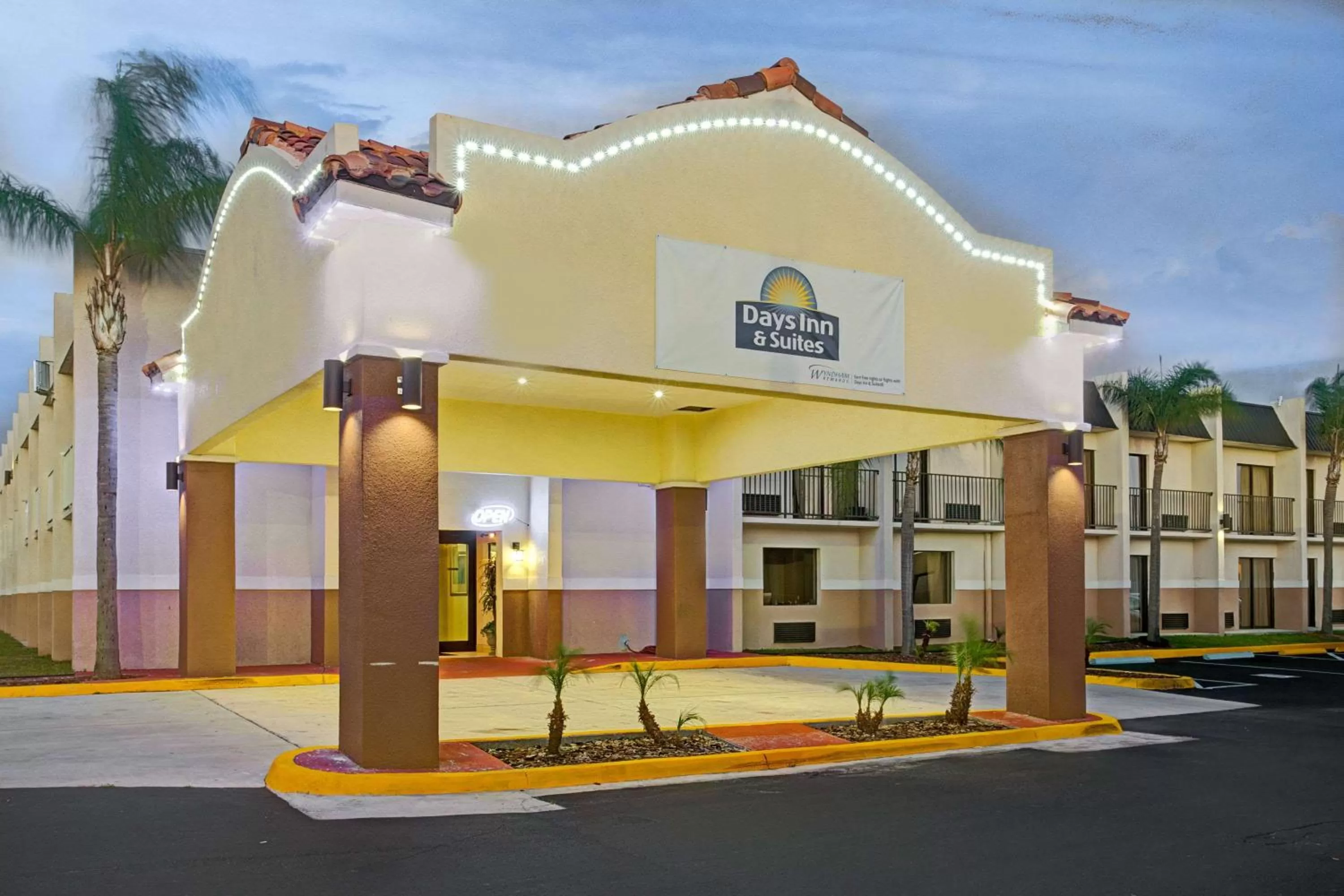 Property building in Days Inn & Suites by Wyndham Tampa - Ybor City