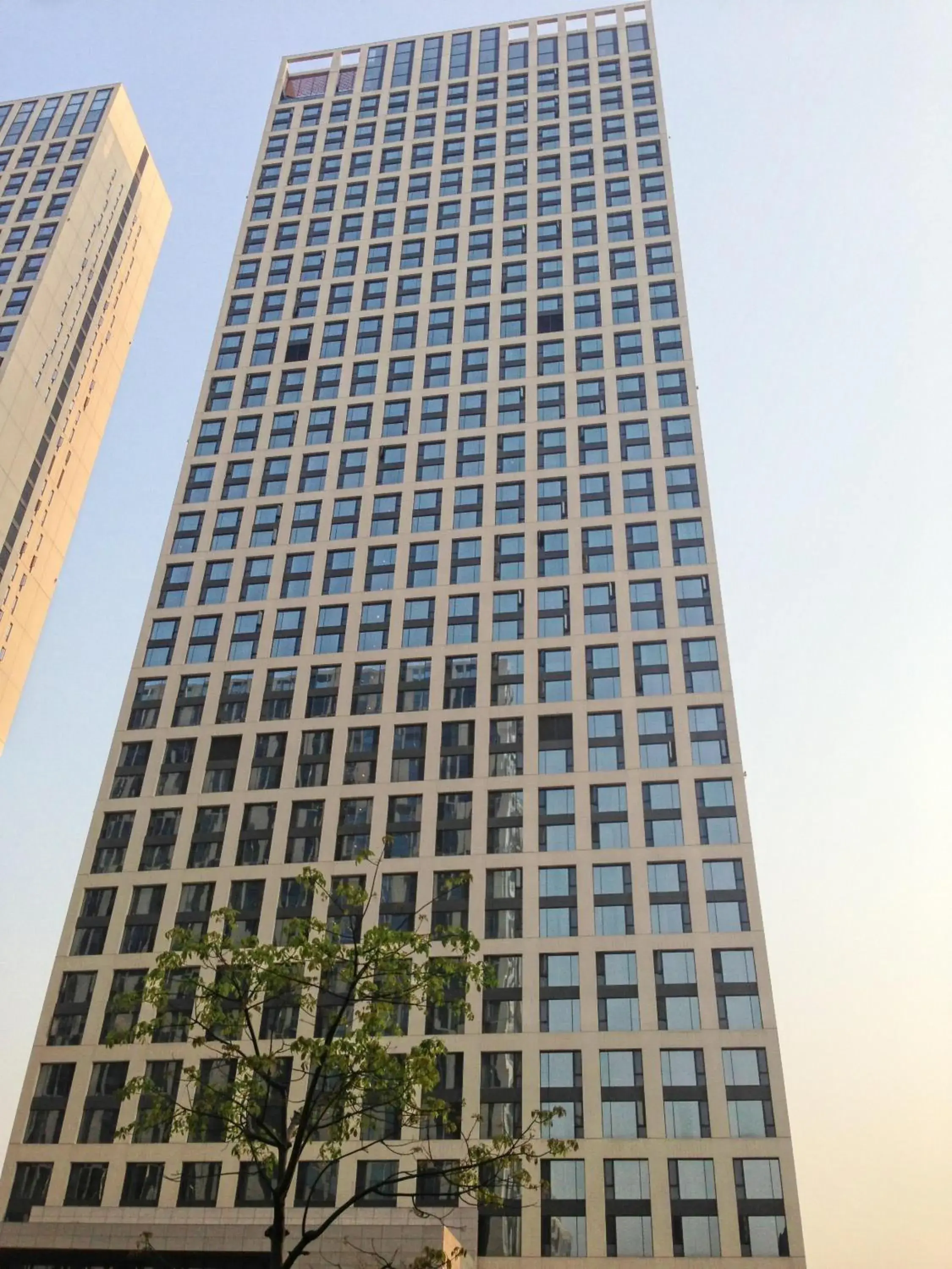 Facade/entrance, Property Building in Guangzhou Xing Yi International Apartment - Poly World Branch