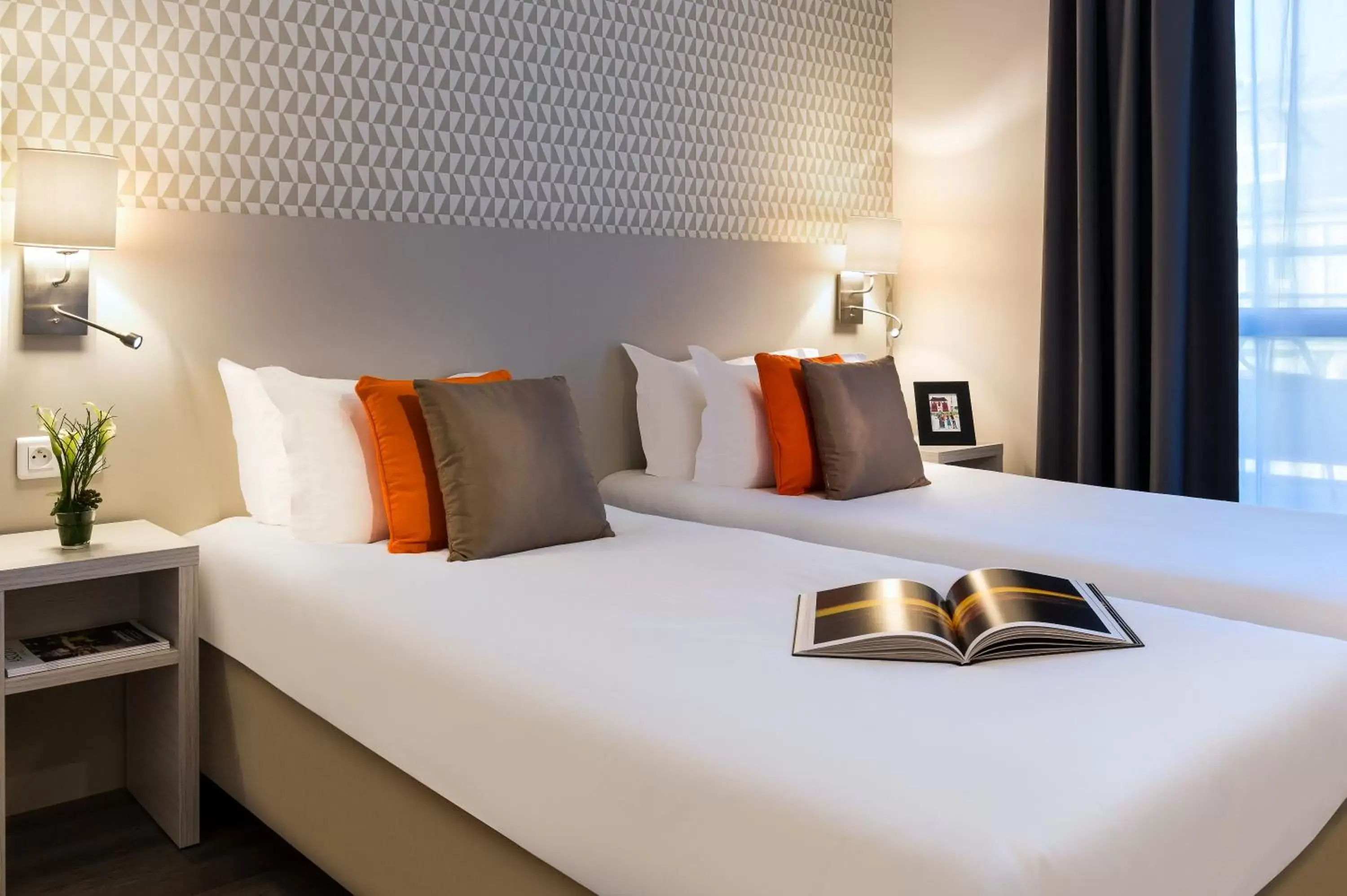 Bed, Room Photo in Citadines Montmartre Paris
