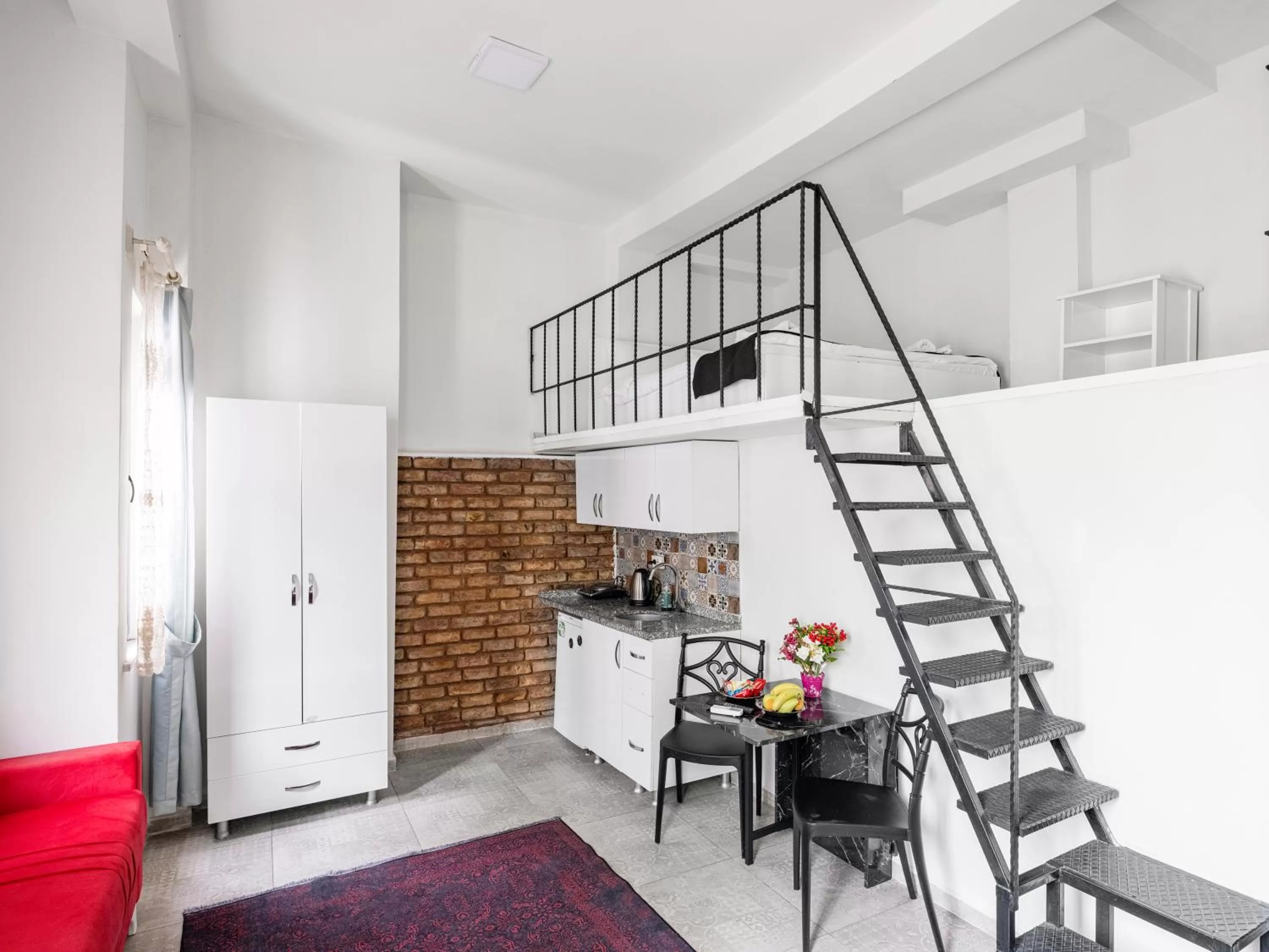 Kitchen or kitchenette in The Red Tent Suite 88