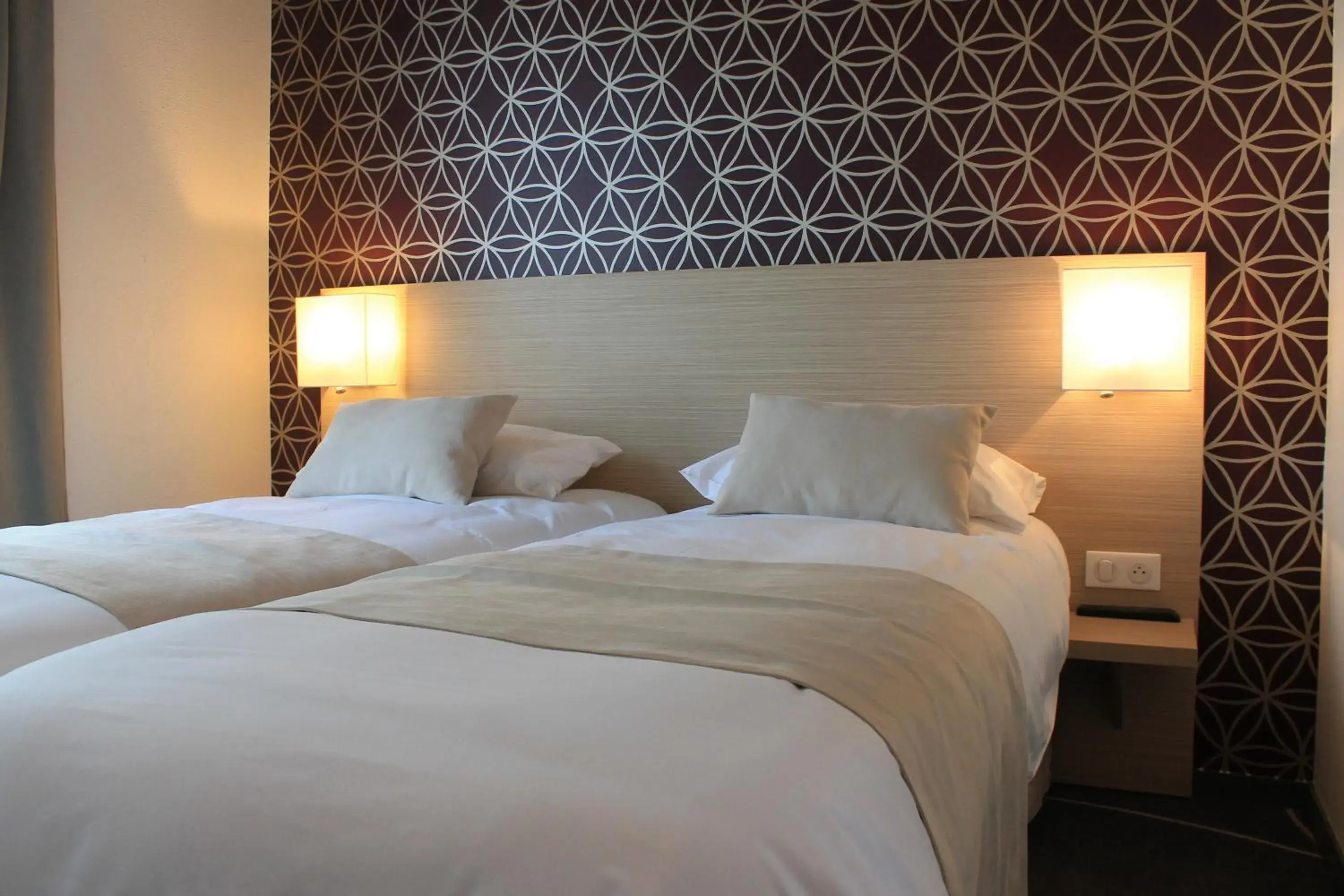 Twin Room in Hôtel Le Blason Twin Room in Hôtel Le Blason