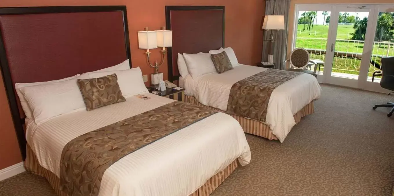 Bed in Safety Harbor Resort & Spa Trademark Collection by Wyndham