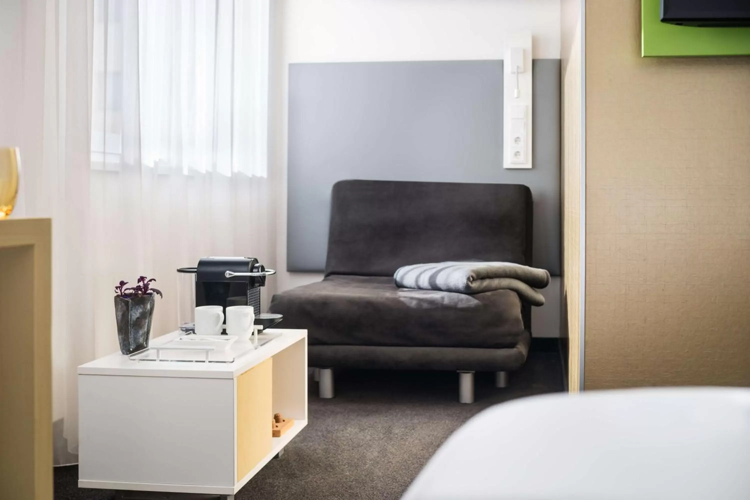 Bedroom, Seating Area in Lindner Hotel Frankfurt Sportpark part of JdV by Hyatt