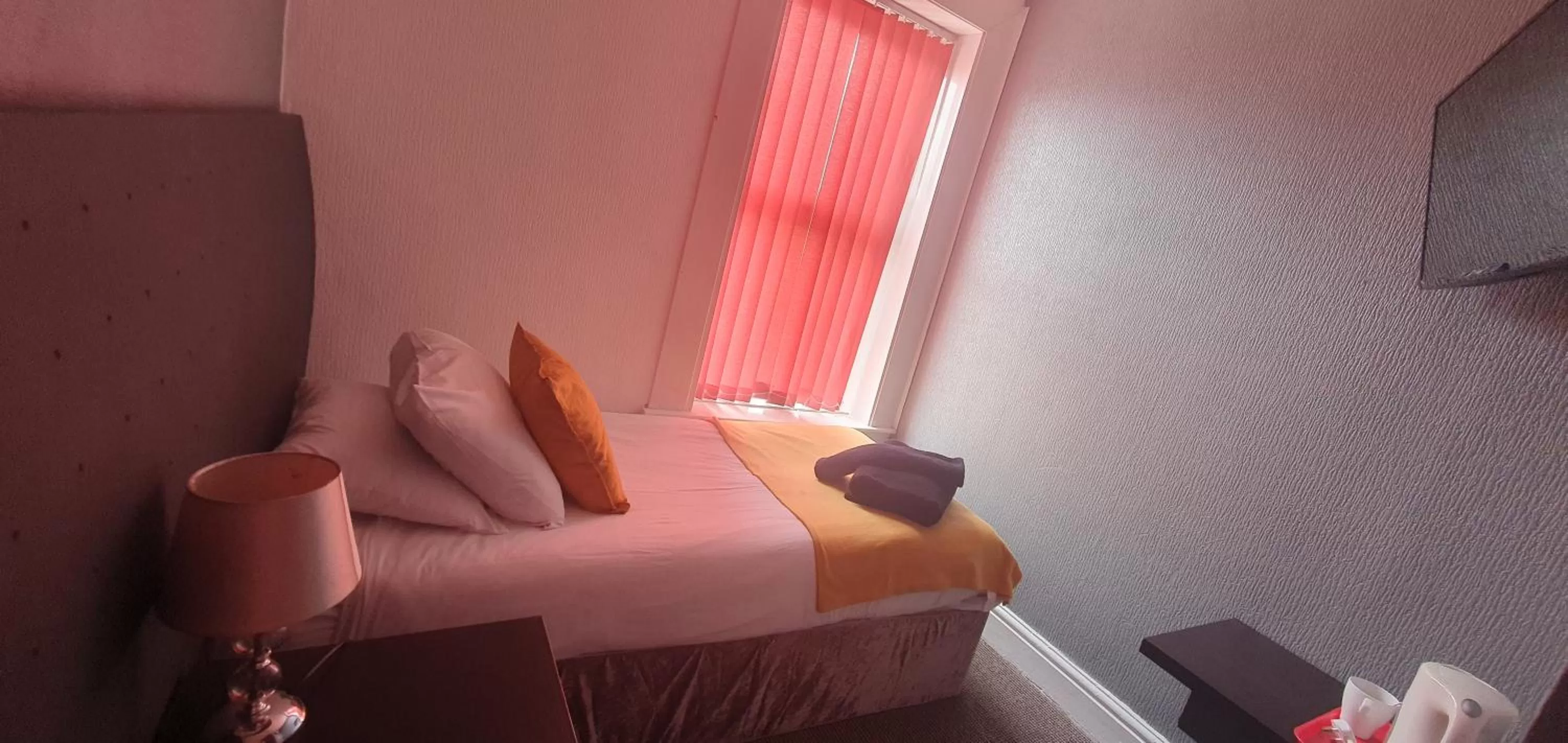 Bed in Palm Beach Hotel by the Sea